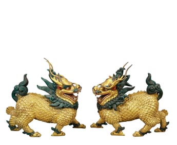 A Pair of Rare Gilt Bronze Kylin Ornaments
