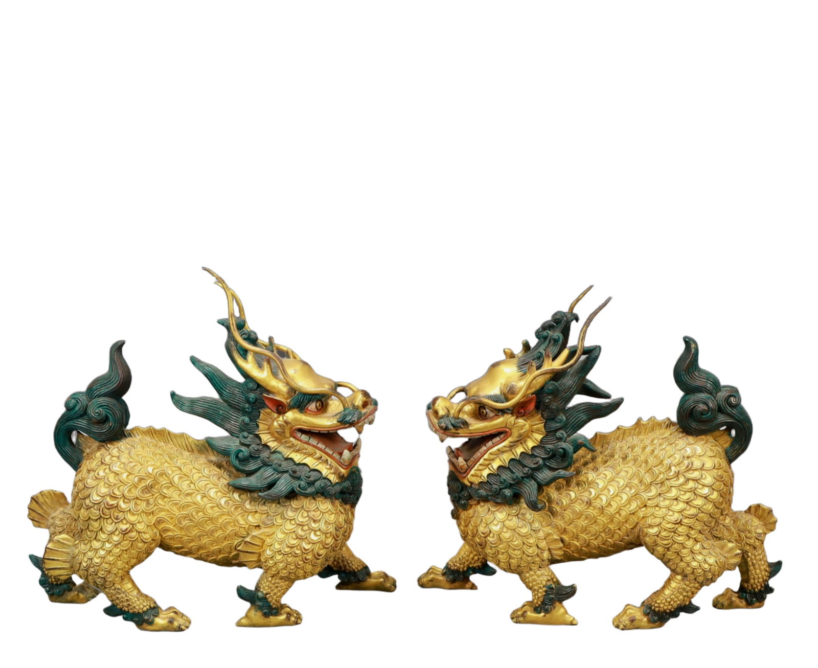 A Pair of Rare Gilt Bronze Kylin Ornaments: A Pair of Rare Gilt Bronze Kylin Ornaments,Ming Dynasty, China,Size:9.8inx3inx8.9in,Total Weight:8450g 一对铜鎏金麒麟摆件,中国明