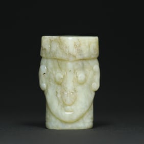 An Exquisite White Jade Figure-Face Pattern Pendant