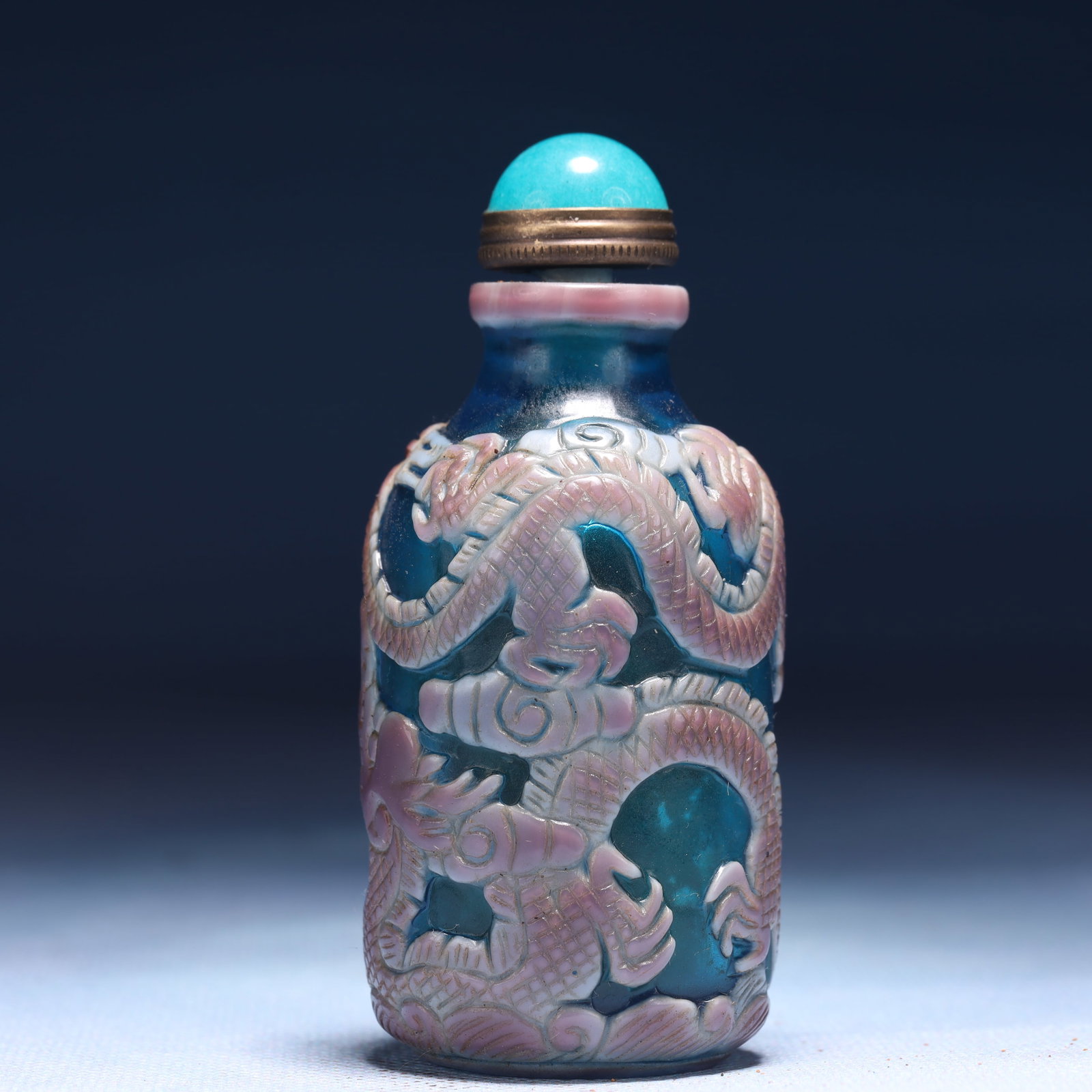 An Exquisite Glass Auspicious Cloud and Dragon Pattern Snuff Bottle: An Exquisite Glass Auspicious Cloud and Dragon Pattern Snuff Bottle,Qing Dynasty,China,Daoguang Four-character Mark,Size:1.6inx3.3in,Weight:106g 琉璃祥云龙纹鼻
