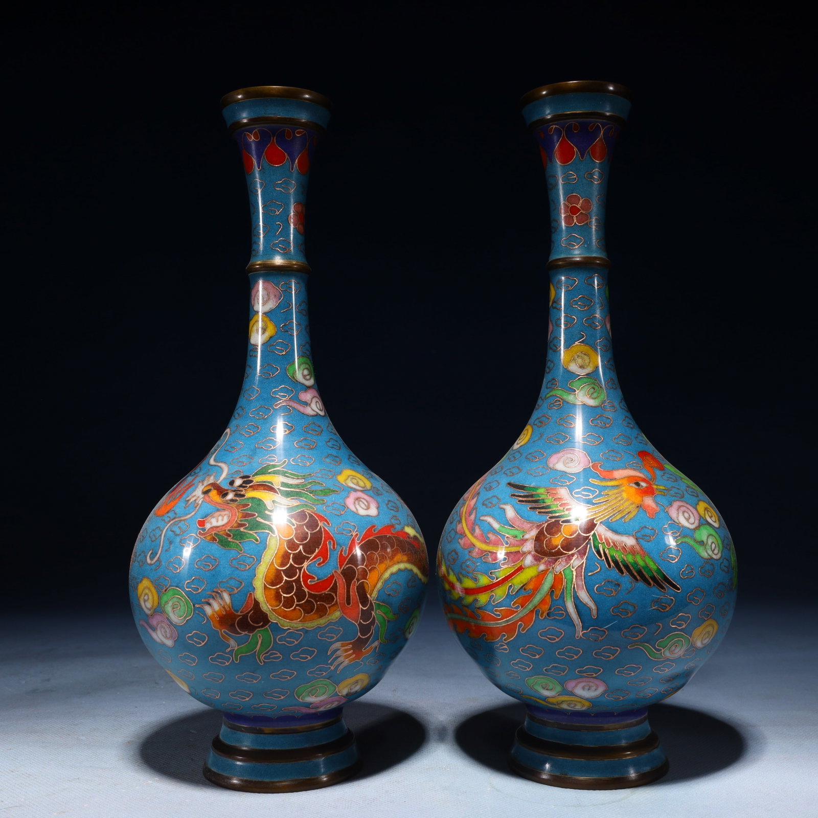A Pair of Exquisite Cloisonne Dragon and Phoenix Pattern Vases: A Pair of Exquisite Cloisonne Dragon and Phoenix Pattern Vases,Qing Dynasty,China,Qianlong Four-character Mark,Size:10.6inx4.7inx4.7in,Weight:2250g 一对景泰蓝龙