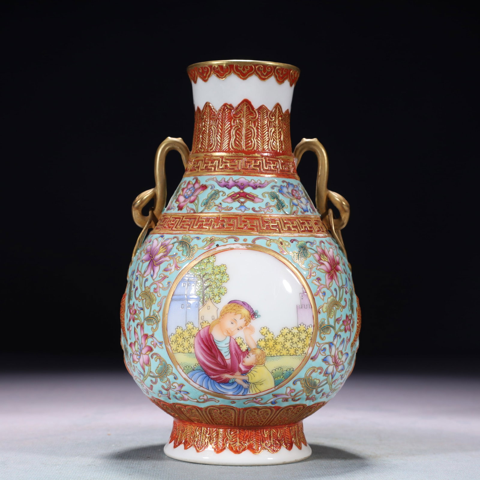 An Exquisite Turquoise Glazed Famille-Rose Painted Gold Figure Pattern Double-Ears Vase: An Exquisite Turquoise Glazed Famille-Rose Painted Gold Figure Pattern Double-Ears Vase,Qing Dynasty,China,Qianlong Four-character Mark,Size:4.3inx7.5in,Weight:600g