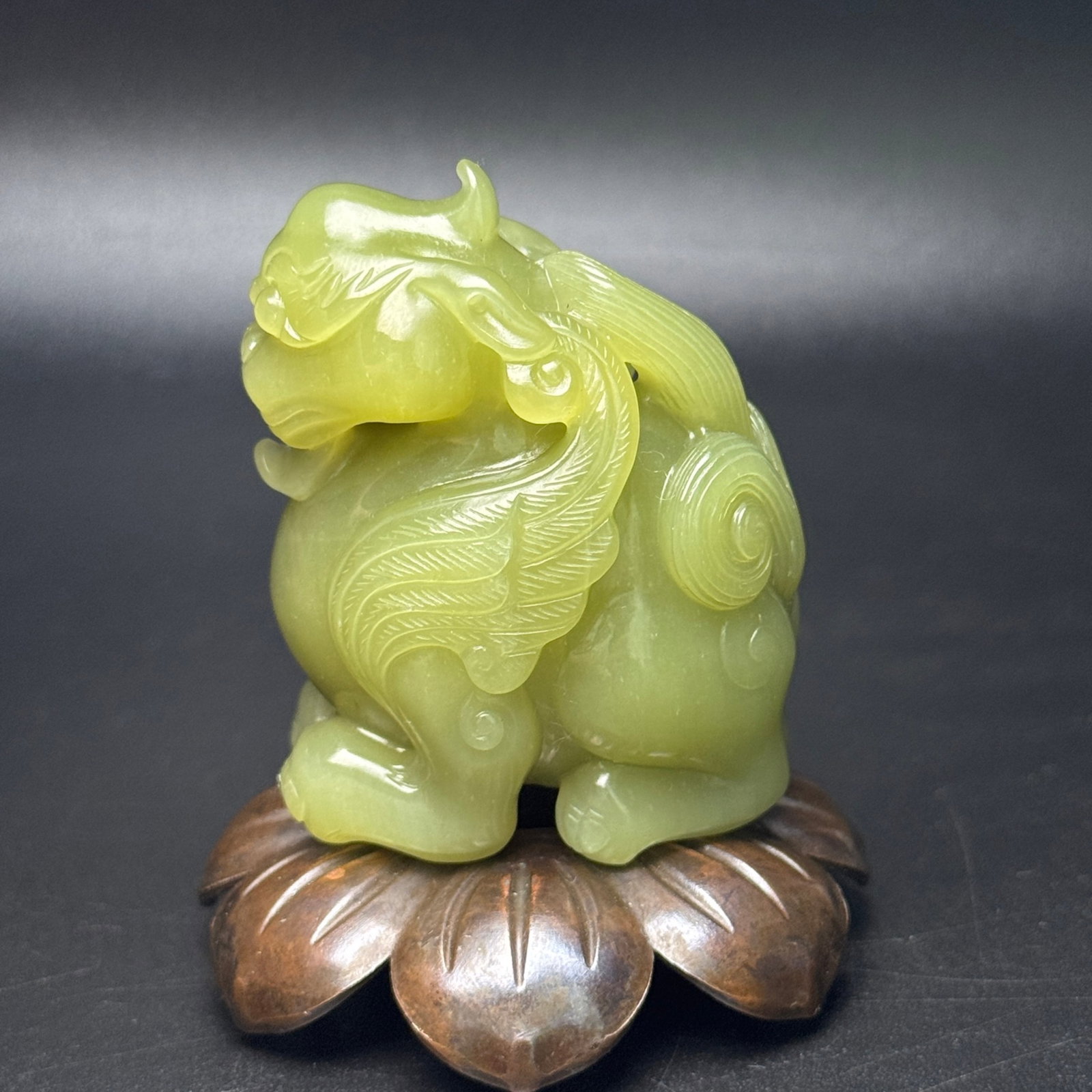 An Exquisite Yellow Jade Auspicious Beast Hand Piece: An Exquisite Yellow Jade Auspicious Beast Hand Piece,Qing Dynasty,China,Size:2.2inx1.8inx1.3in,Weight:132g 黄玉瑞兽手把件,中国清代