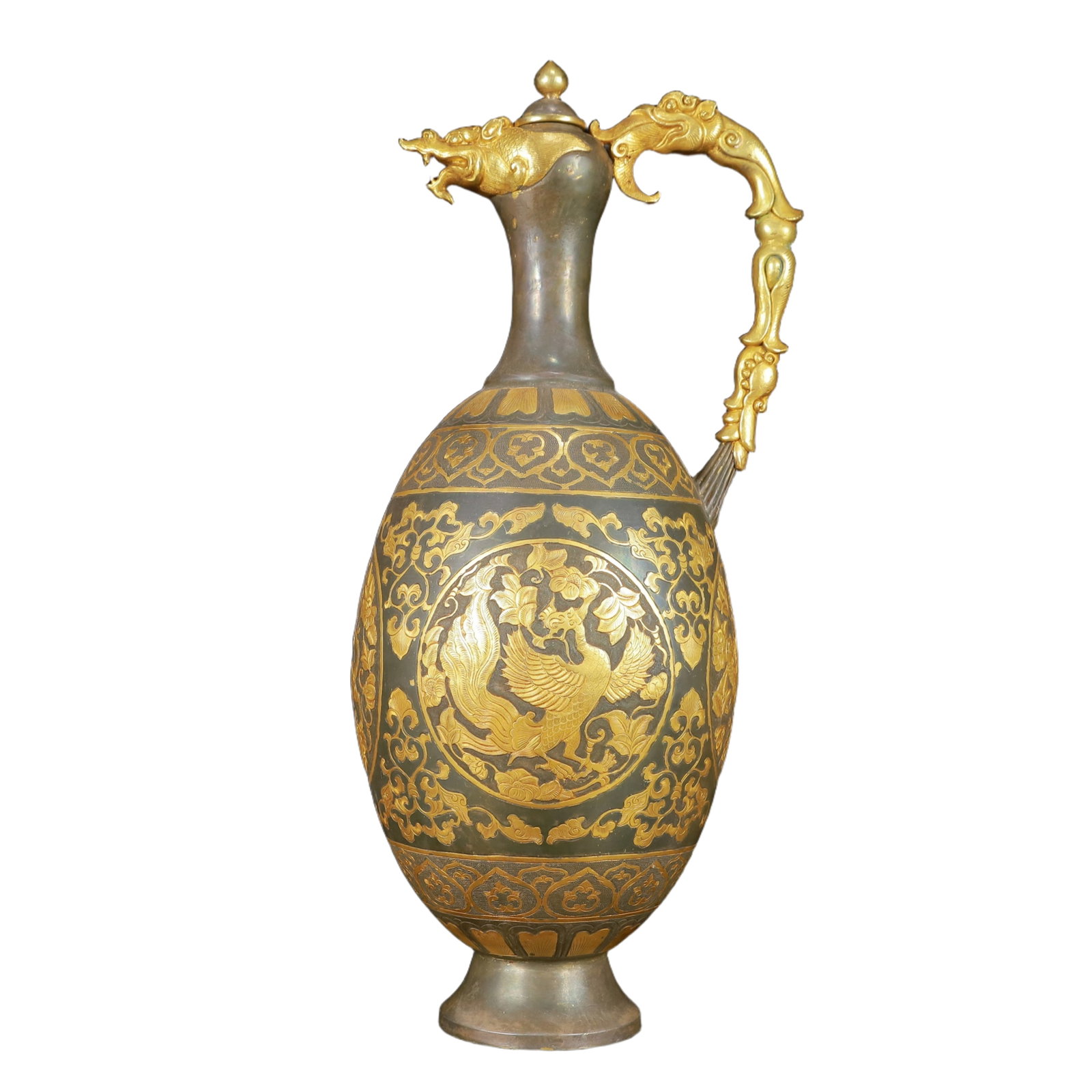 A Huge Gilt Silver Auspicious Beast Pattern Ewer: A Huge Gilt Silver Auspicious Beast Pattern Ewer,Tang Dynasty,China,Zhenguan Four-Character Mark,Size:6.3inx5.5inx15.7in,Weight:2350g