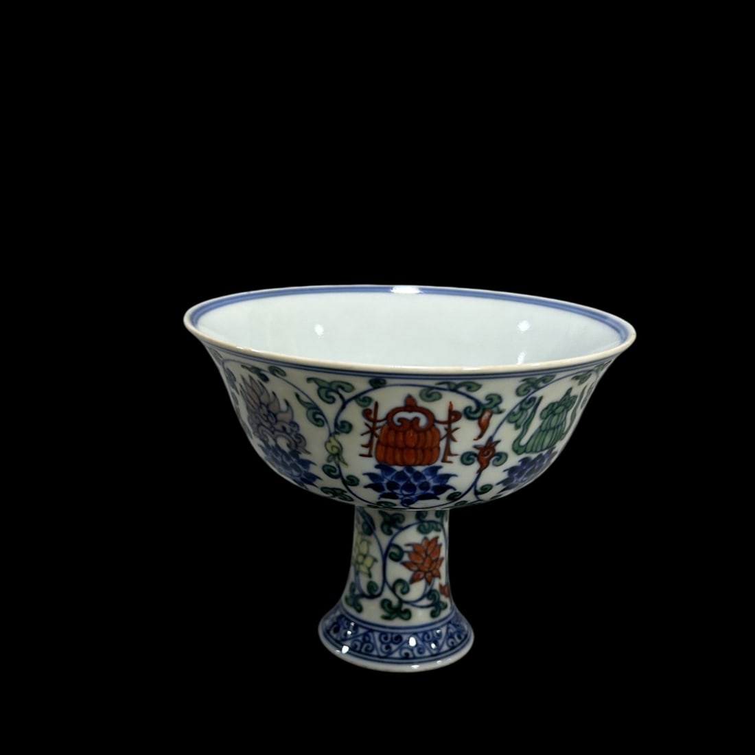 An Exquisite Doucai Lotus and Eight Treasures Pattern Stem Cup: An Exquisite Doucai Lotus and Eight Treasures Pattern Stem Cup,Ming Dynasty,China,Xuande Six-character Mark,Size:3.5inx4.1in