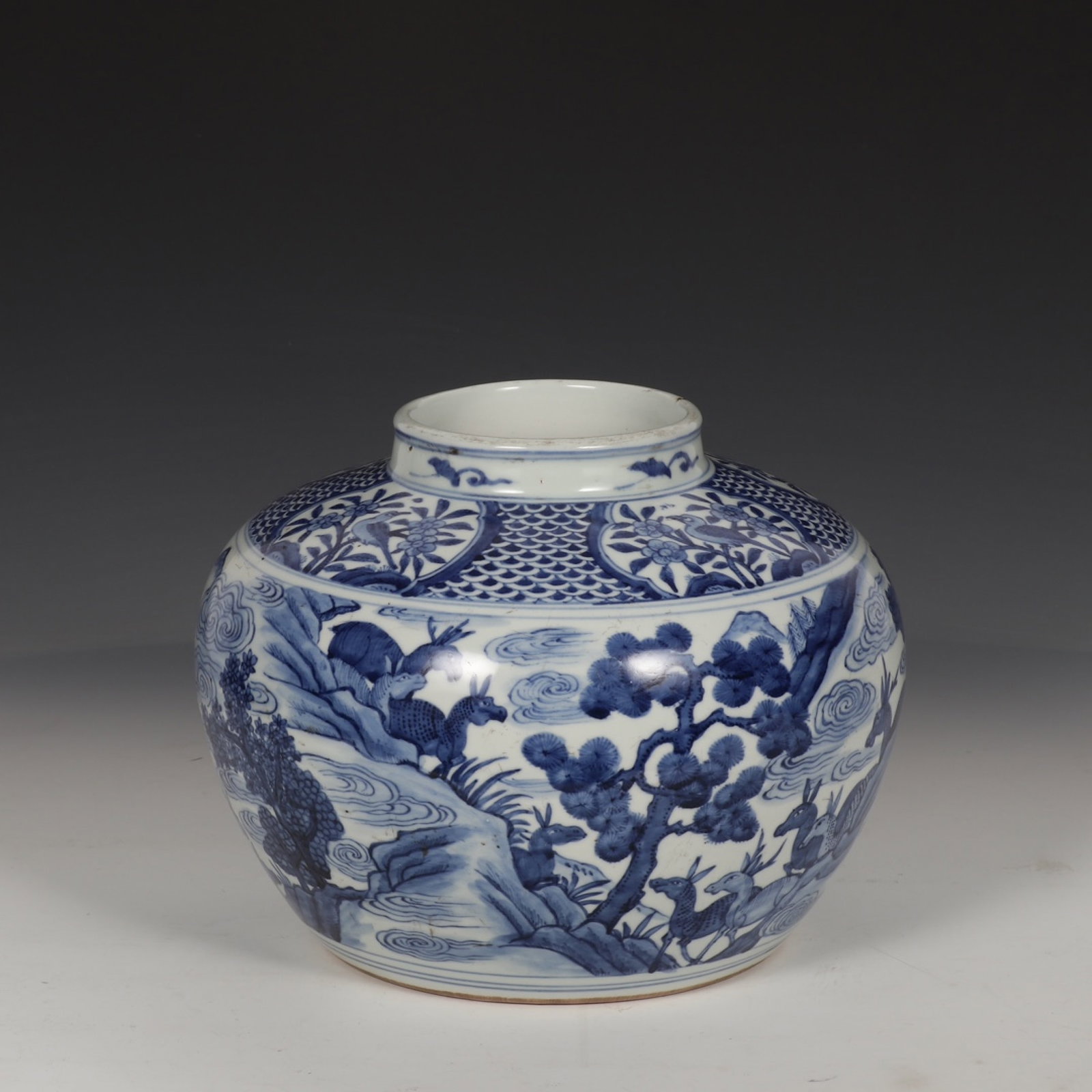 An Exquisite Blue and White Pine and Deer Pattern Jar: An Exquisite Blue and White Pine and Deer Pattern Jar,Ming Dynasty,China,Jiajing Six-character Mark,Size:8.1inx9.4in