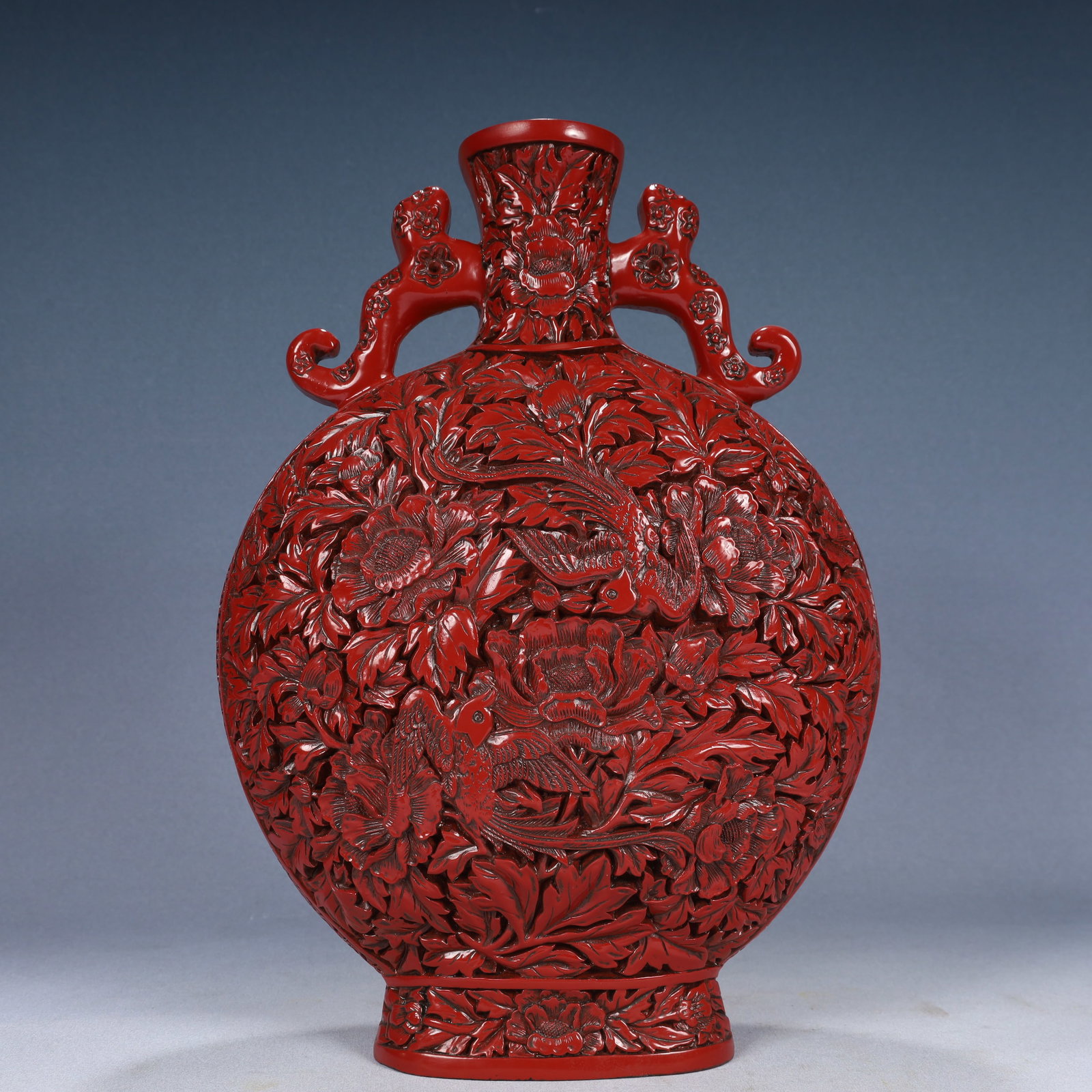 A Rare Carved Red Lacquer Flower and Bird Pattern Double-Ears Vase: A Rare Carved Red Lacquer Flower and Bird Pattern Double-Ears Vase,Qing Dynasty, China,Qianlong Six-character Mark,Size:9.8inx3.1inx14.6in,Weight:1550g 剔红漆花鸟纹