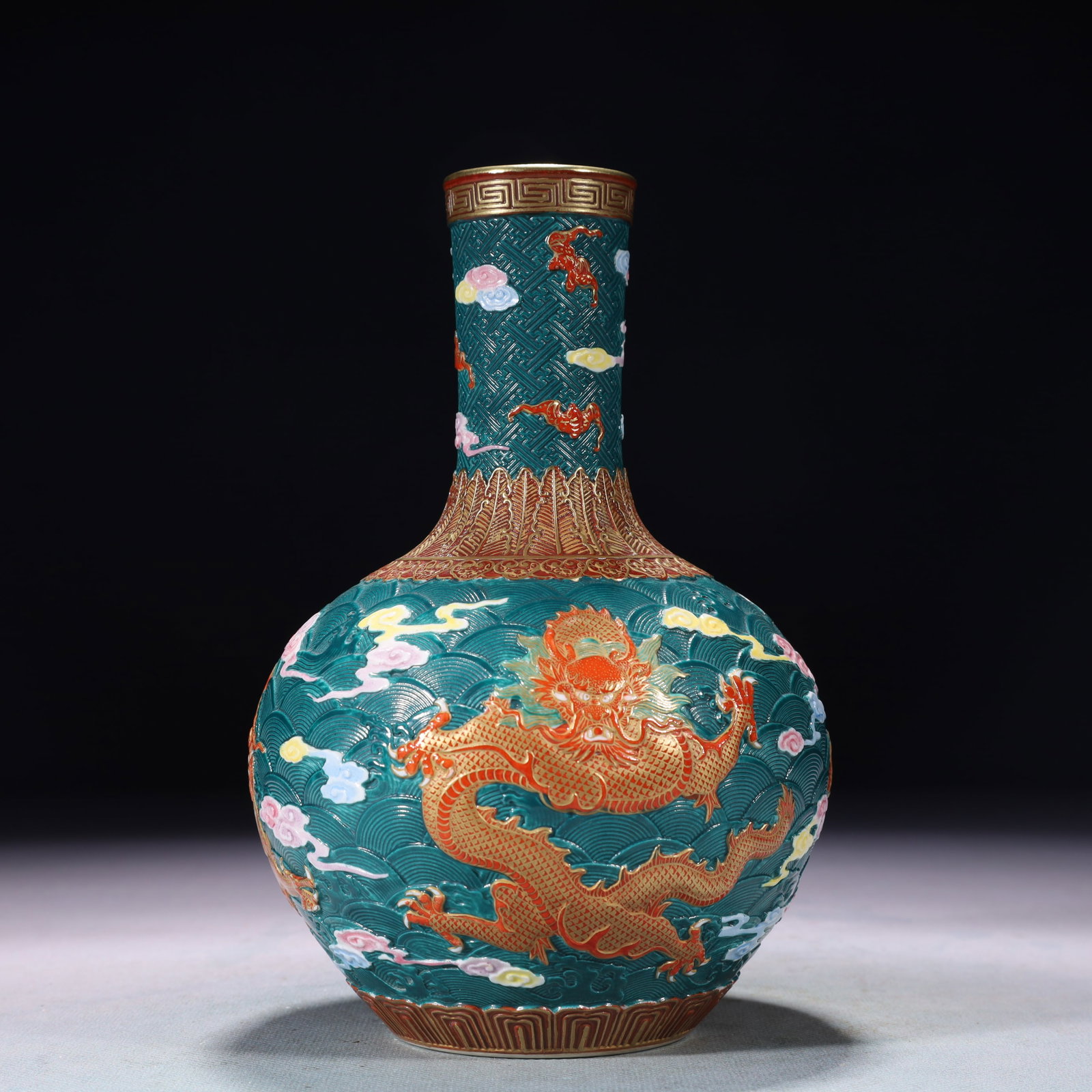 An Exquisite Enamel Painted Gold Auspicious Cloud and Dragon Pattern Vase: An Exquisite Enamel Painted Gold Auspicious Cloud and Dragon Pattern Vase,Qing Dynasty,China,Qianlong Six-character Mark,Size:4.7inx7.9in,Weight:650g 珐琅彩描金祥&#