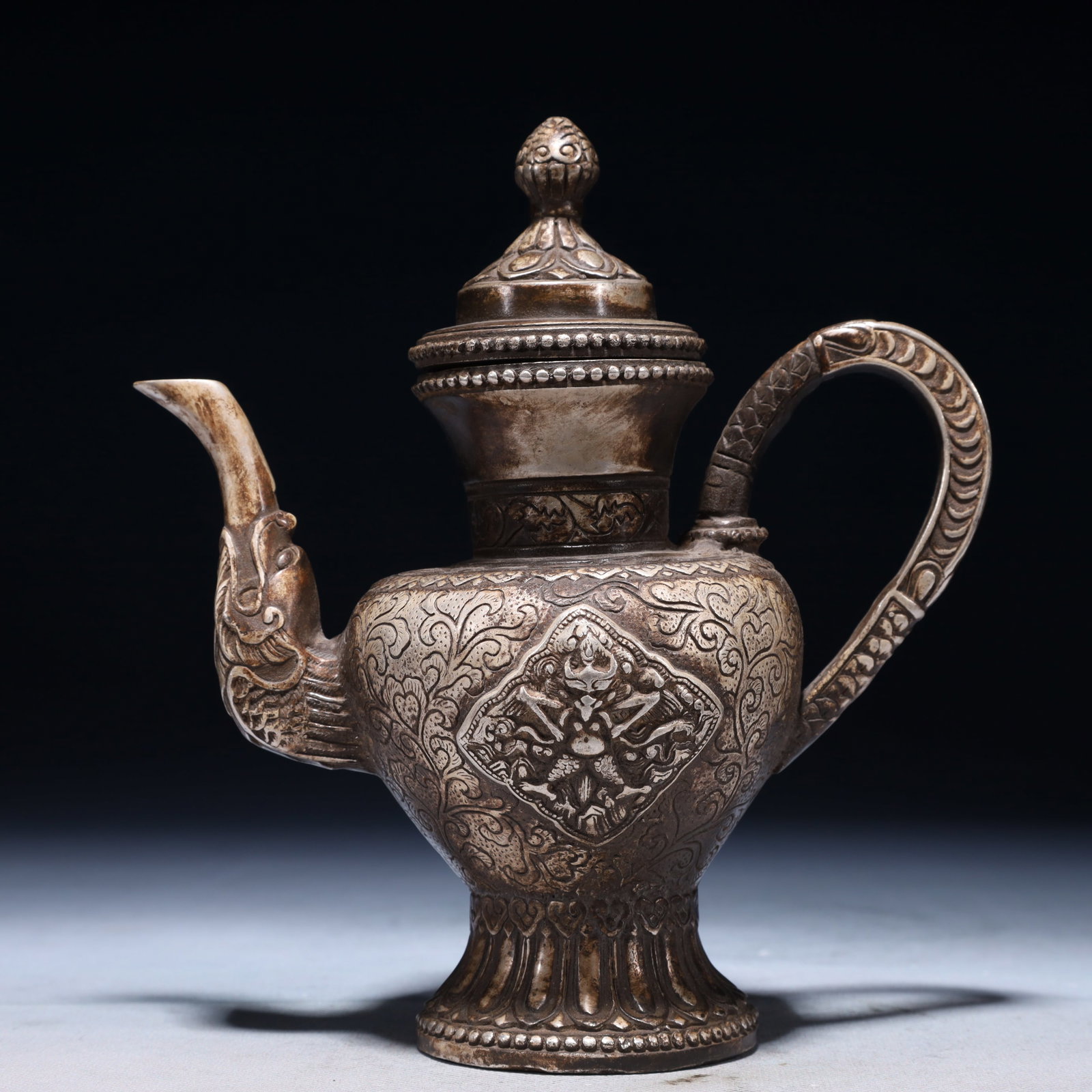 An Exquisite Silver-plated Bronze Lotus Pattern Ewer: An Exquisite Silver-plated Bronze Lotus Pattern Ewer,Qing Dynasty,China,Size:7.1inx3.5inx7.9in,Weight:950g