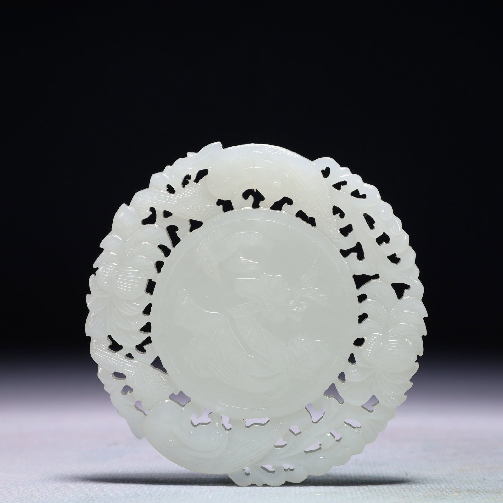 An Exquisite White Jade Figure Pattern Pendant: An Exquisite White Jade Figure Pattern Pendant,Qing Dynasty,China,Size:3.1inx3.1in,Weight:67.5g 白玉人物纹佩,中国清代