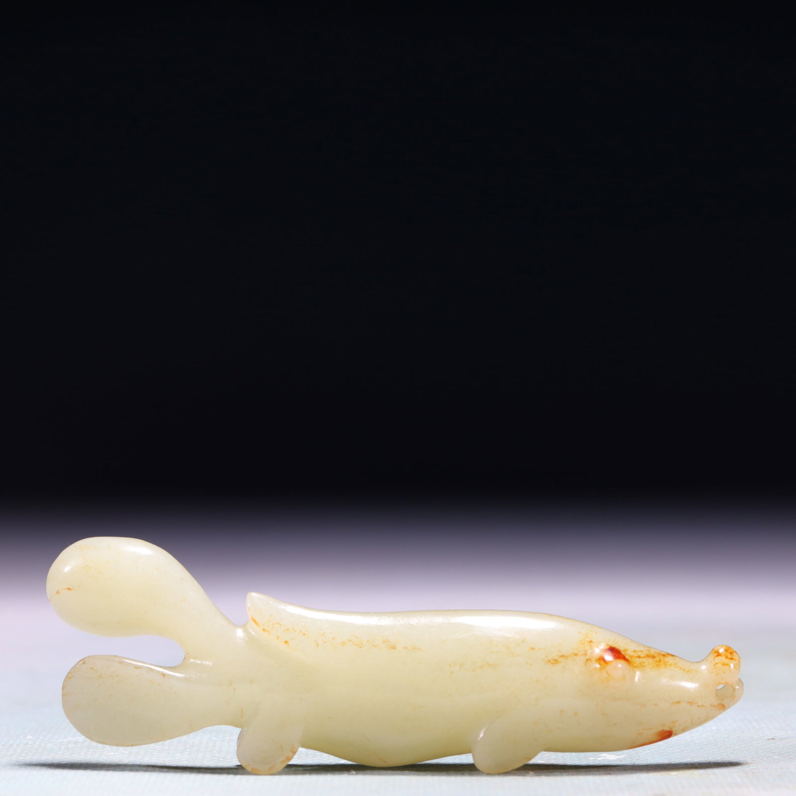 An Exquisite White Jade Fish Ornament: An Exquisite White Jade Fish Ornament,Qing Dynasty,China,Size:3.9inx0.6inx1.2in,Weight:55.8g 白玉鱼摆件,中国清代