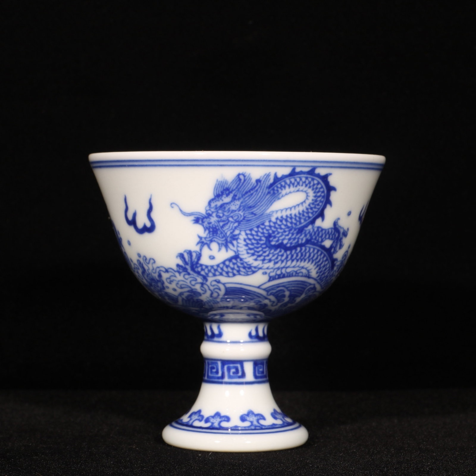 An Exquisite Blue and White Seawater and Dragon Pattern Stem Cup: An Exquisite Blue and White Seawater and Dragon Pattern Stem Cup,Qing Dynasty,China,Yongzheng Six-character Mark,Size:3.1inx3.1in