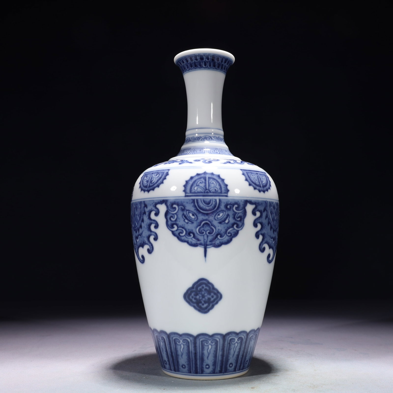 An Exquisite Blue and White Beast-Face Pattern Vase: An Exquisite Blue and White Beast-Face Pattern Vase,Qing Dynasty,China,Qianlong Six-character Mark,Size:4.3inx10.6in,Weight:1800g