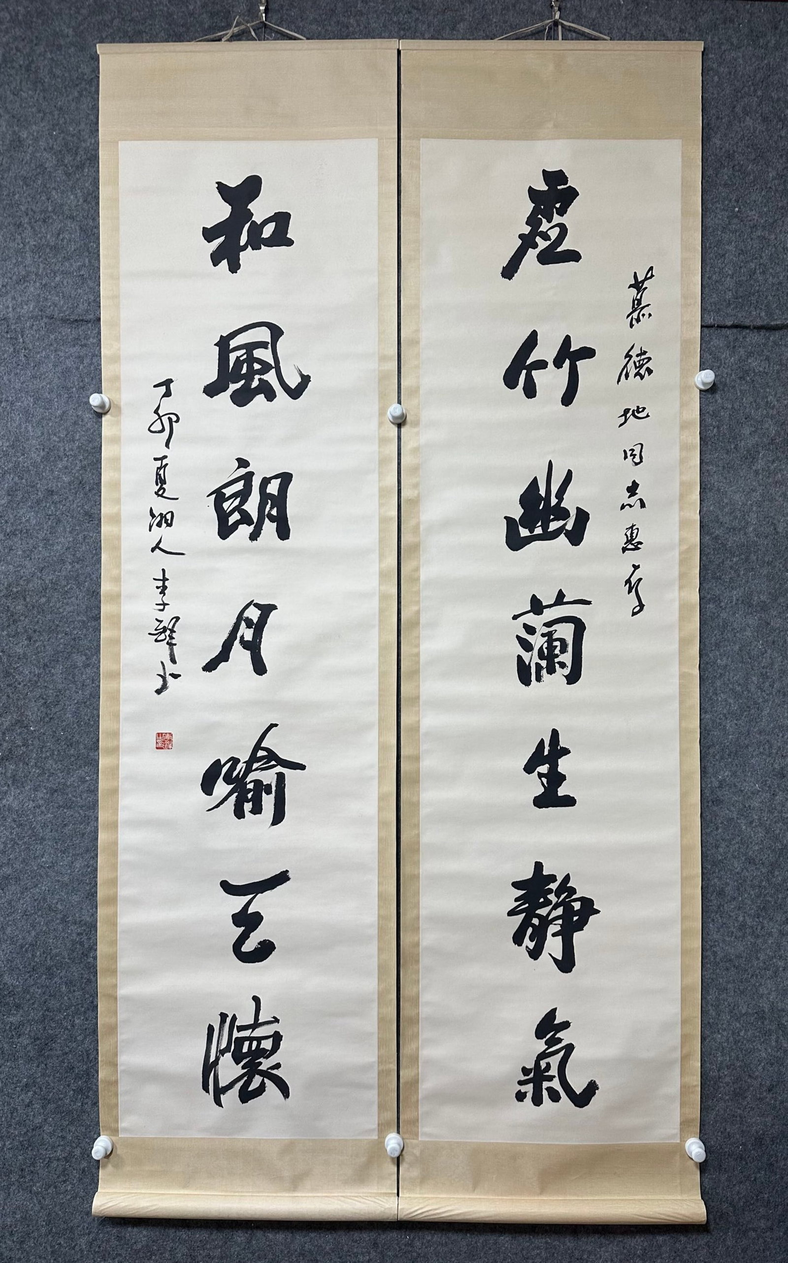 A Chinese Vertical Scroll Ink Calligraphy Couplet on Paper: A Chinese Vertical Scroll Ink Calligraphy Couplet on Paper,Li Duo,Size:18.1inx69.7in*2 一副中国水墨书法对联立轴,李铎