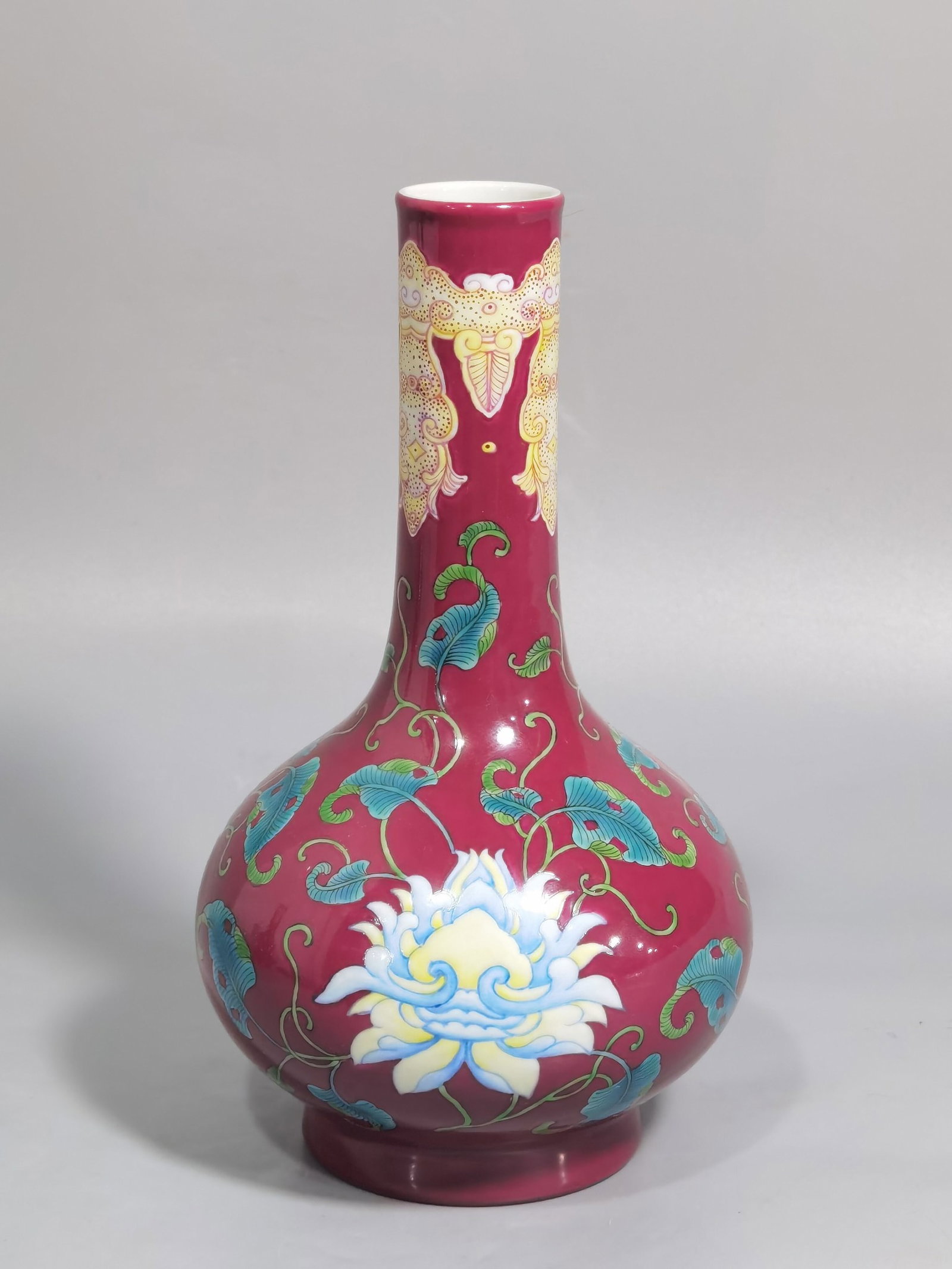 An Exquisite Enamel Ruby Red-Glazed Lotus Pattern Vase: An Exquisite Enamel Ruby Red-Glazed Lotus Pattern Vase,Qing Dynasty,China,Kangxi Four-character Mark,Size:7.2inx4.1in 珐琅彩胭脂红缠枝莲纹&#