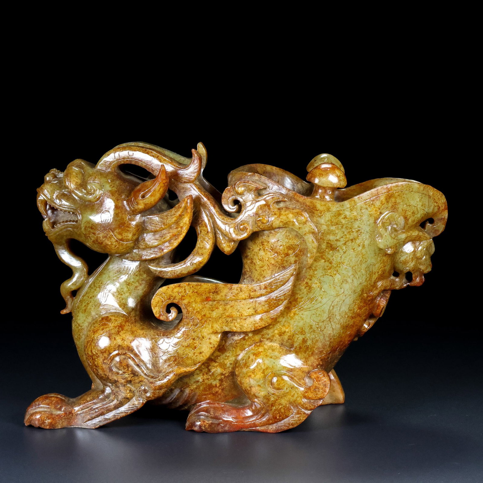 An Exquisite Archaic Jade Dragon Goblet: An Exquisite Archaic Jade Dragon Goblet,Ancient Time,China,Size:5.9inx8.7inx3.1in,Weight:2131g 高古玉龙爵杯,中国远古时期