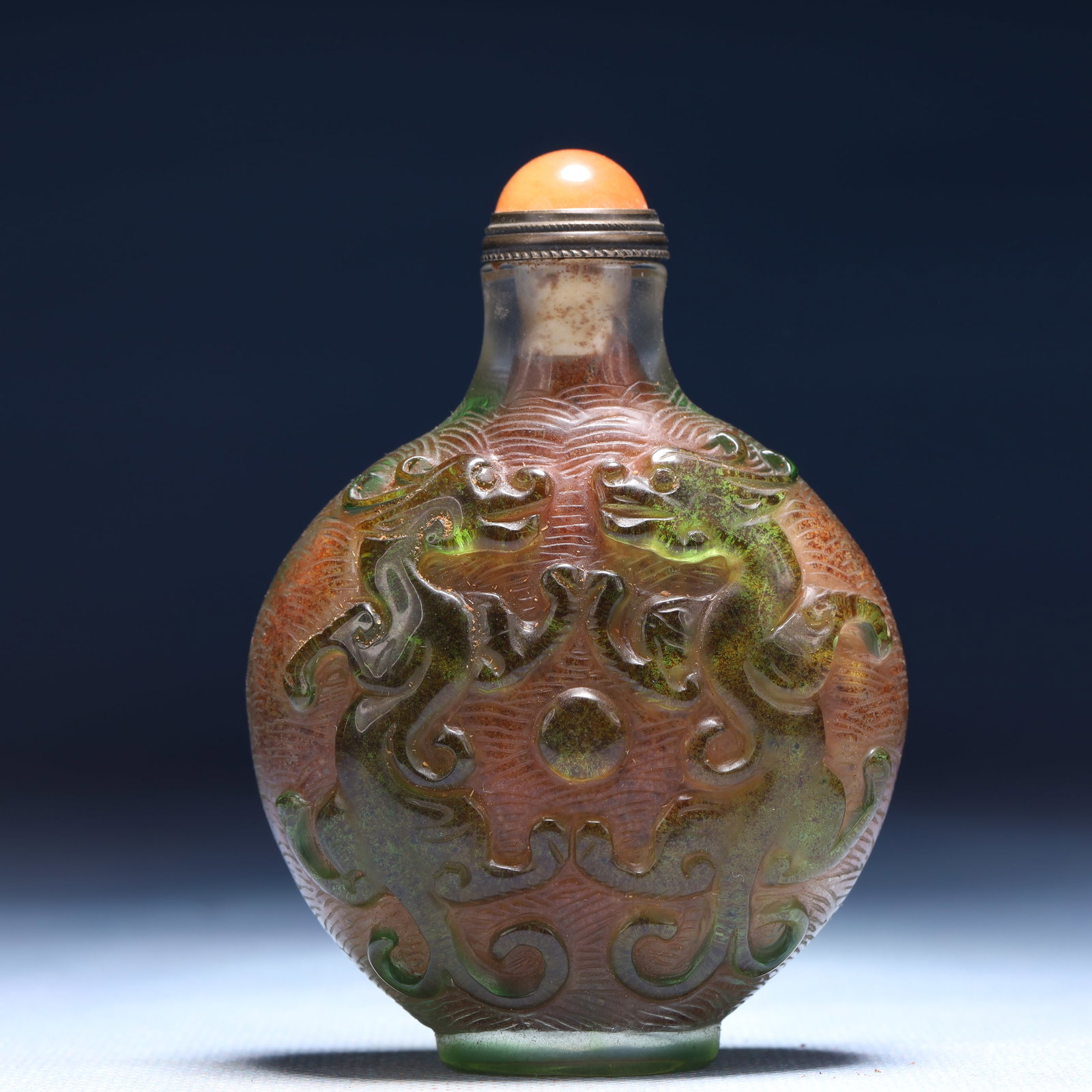 An Exquisite Glass Chi-Dragon Pattern Snuff Bottle: An Exquisite Glass Chi-Dragon Pattern Snuff Bottle,Qing Dynasty,China,Guangxu Four-character Mark,Size:2.4inx1.2inx3.1in,Weight:78g 琉璃螭龙纹鼻烟壶,
