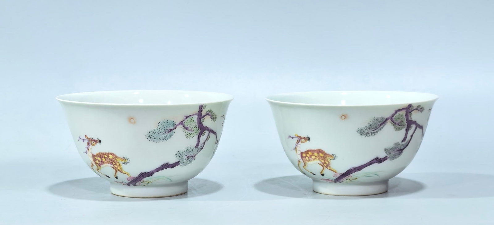 A Pair of Exquisite Famille-Rose Pine and Deer Pattern Cups: A Pair of Exquisite Famille-Rose Pine and Deer Pattern Cups,Qing Dynasty,China,Yongzheng Six-character Mark,Size:2inx3.7in