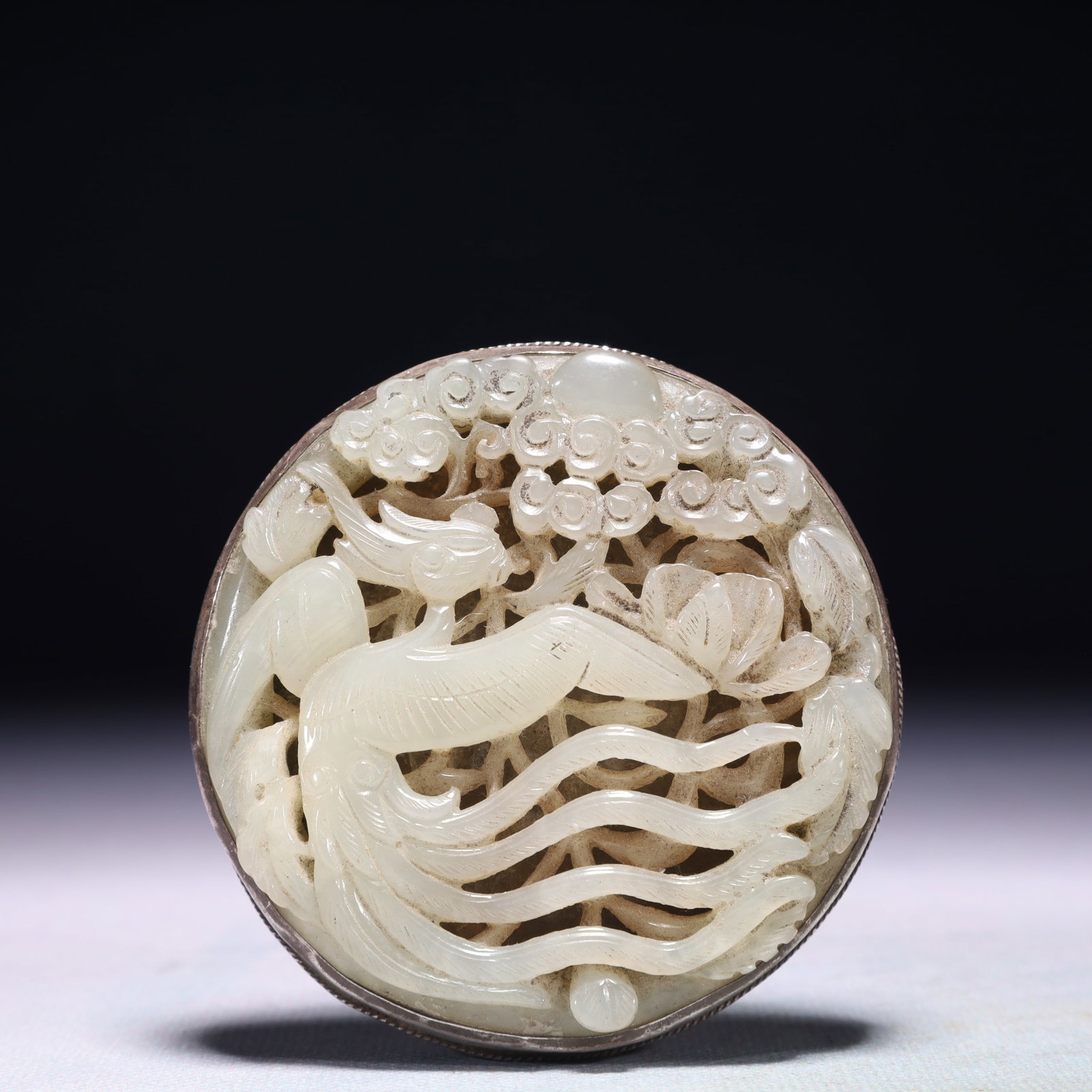 An Exquisite Silver Inlaid White Jade Flower and Phoenix Pattern Pendant: An Exquisite Silver Inlaid White Jade Flower and Phoenix Pattern Pendant,Qing Dynasty,China,Size:3inx3in,Weight:98.3g 银嵌白玉花卉凤纹佩,中&