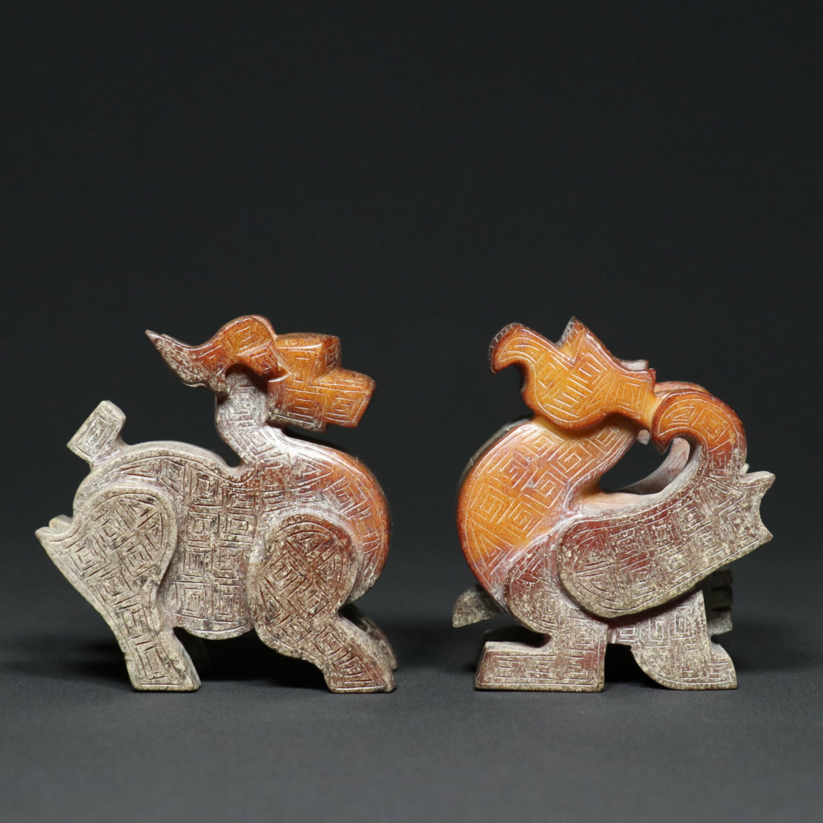 A Pair of Exquisite White Jade Dragon and Phoenix Ornaments: A Pair of Exquisite White Jade Dragon and Phoenix Ornaments,Qing Dynasty,China,Size:(Dragon)3.1inx1.6inx3.2in,(Phoenix)2.7inx1.6inx3.2in,Total Weight:625.5g 一对白玉龙