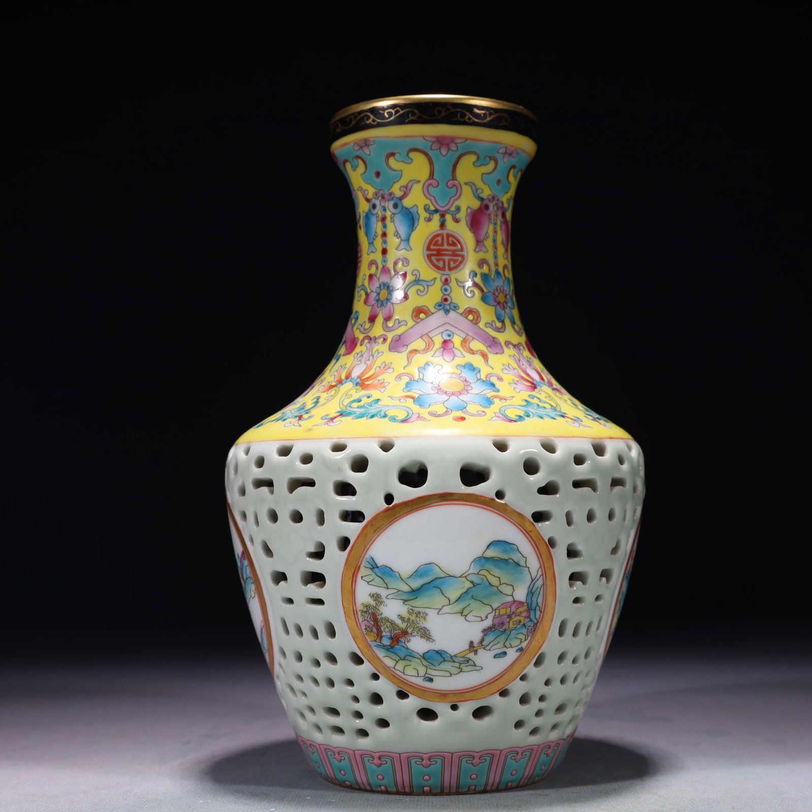 An Exquisite Yellow Ground Famille-Rose Painted Gold Landscape Pattern Vase: An Exquisite Yellow Ground Famille-Rose Painted Gold Landscape Pattern Vase,Qing Dynasty,China,Qianlong Six-character Mark,Size:5.1inx9.1in,Weight:3100g 黄地粉彩描金