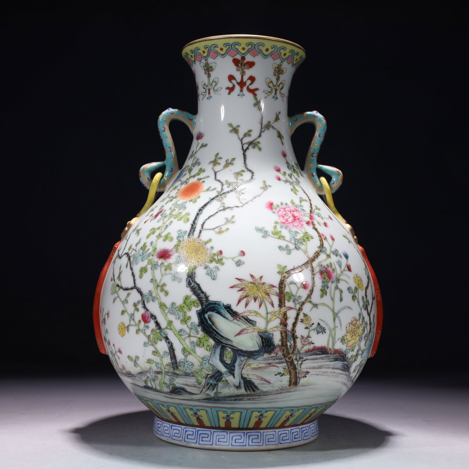 An Exquisite Famille-Rose Painted Gold Flower Pattern Double-Ears Vase: An Exquisite Famille-Rose Painted Gold Flower Pattern Double-Ears Vase,Qing Dynasty,China,Qianlong Six-character Mark,Size:9.4inx13.8in,Weight:4250g 粉彩描金花卉