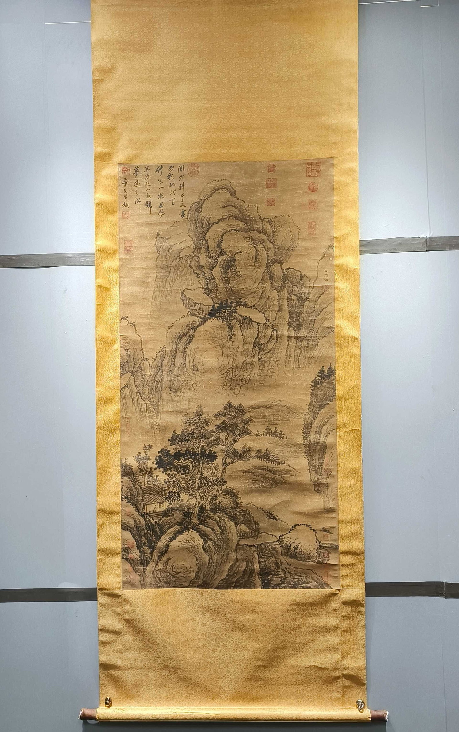 A Chinese Vertical Scroll Ink Painting of Landscape on Paper: A Chinese Vertical Scroll Ink Painting of Landscape on Paper,Ju Ran,Size:49.6inx25.2in 一幅中国水墨山水画立轴,巨然