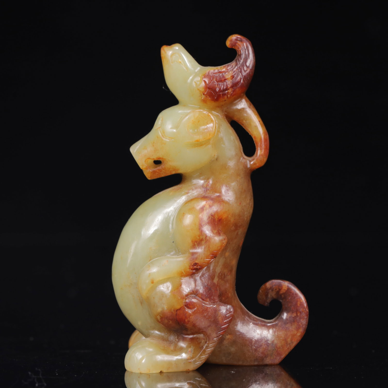An Exquisite Gaogu Jade Auspicious Beast Ornament: An Exquisite Gaogu Jade Auspicious Beast Ornament,Qing Dynasty,China,Size:2.4inx2inx3.9in,Weight:209g 高古玉瑞兽摆件,中国清代