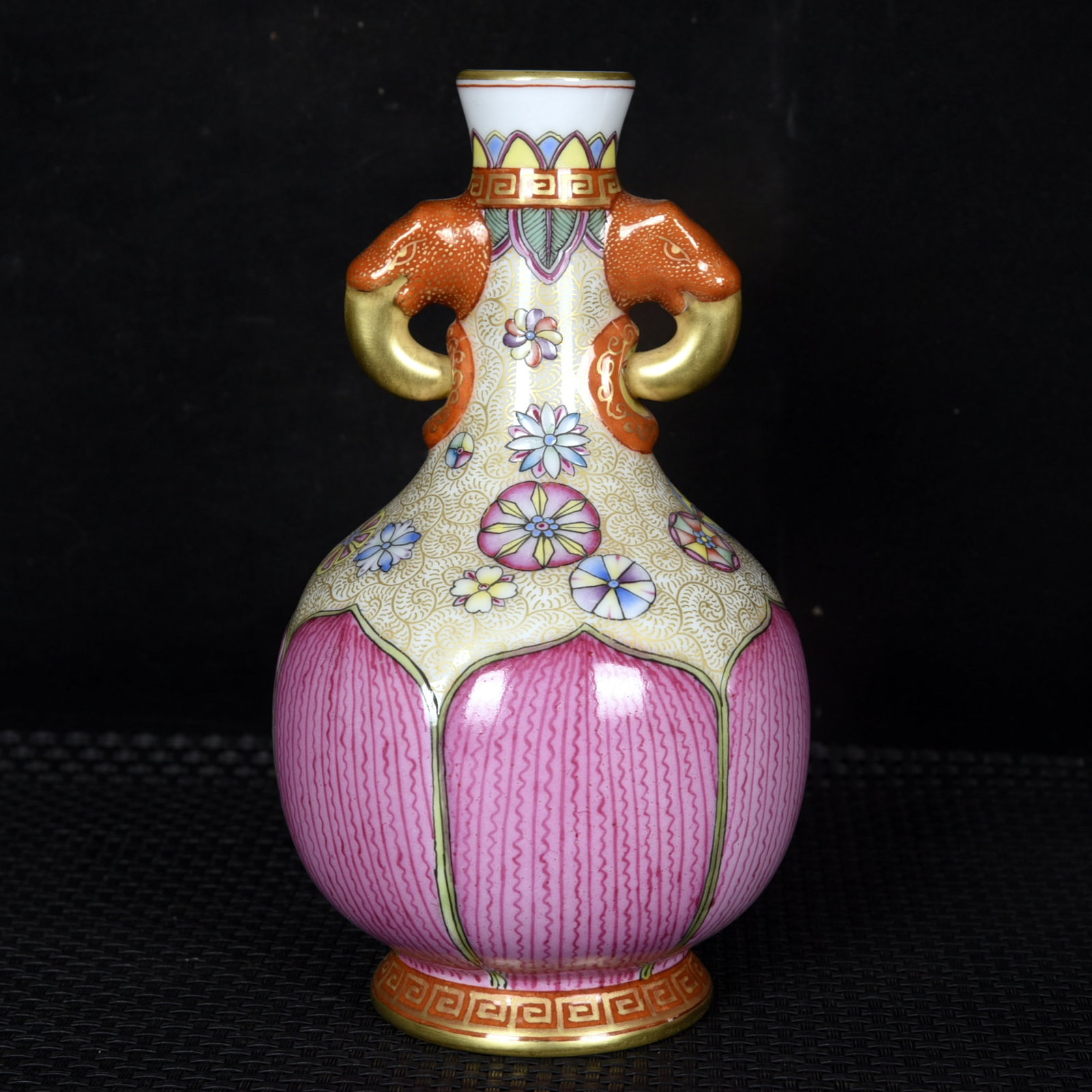 An Exquisite Enamel Painted Gold Flower Pattern Elephant-Ears Vase: An Exquisite Enamel Painted Gold Flower Pattern Elephant-Ears Vase,Qing Dynasty,China,Qianlong Four-character Mark,Size:6.5inx3.7in 珐琅彩描金花卉纹#