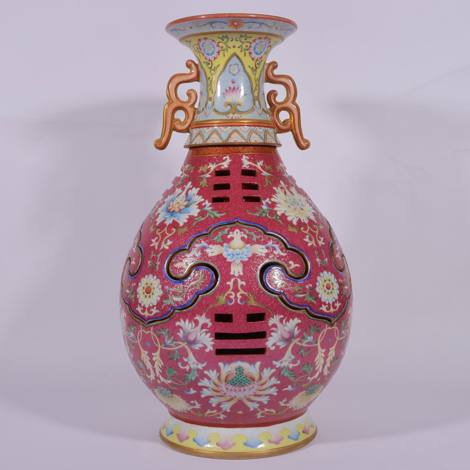 A Huge Famille-Rose Ruby Red-Glazed Painted Gold Lotus Pattern Double-Ears Vase: A Huge Famille-Rose Ruby Red-Glazed Painted Gold Lotus Pattern Double-Ears Vase,Qing Dynasty,China,Qianlong Six-character Mark,Size:24.3inx11.8in 粉彩胭脂红描ດ