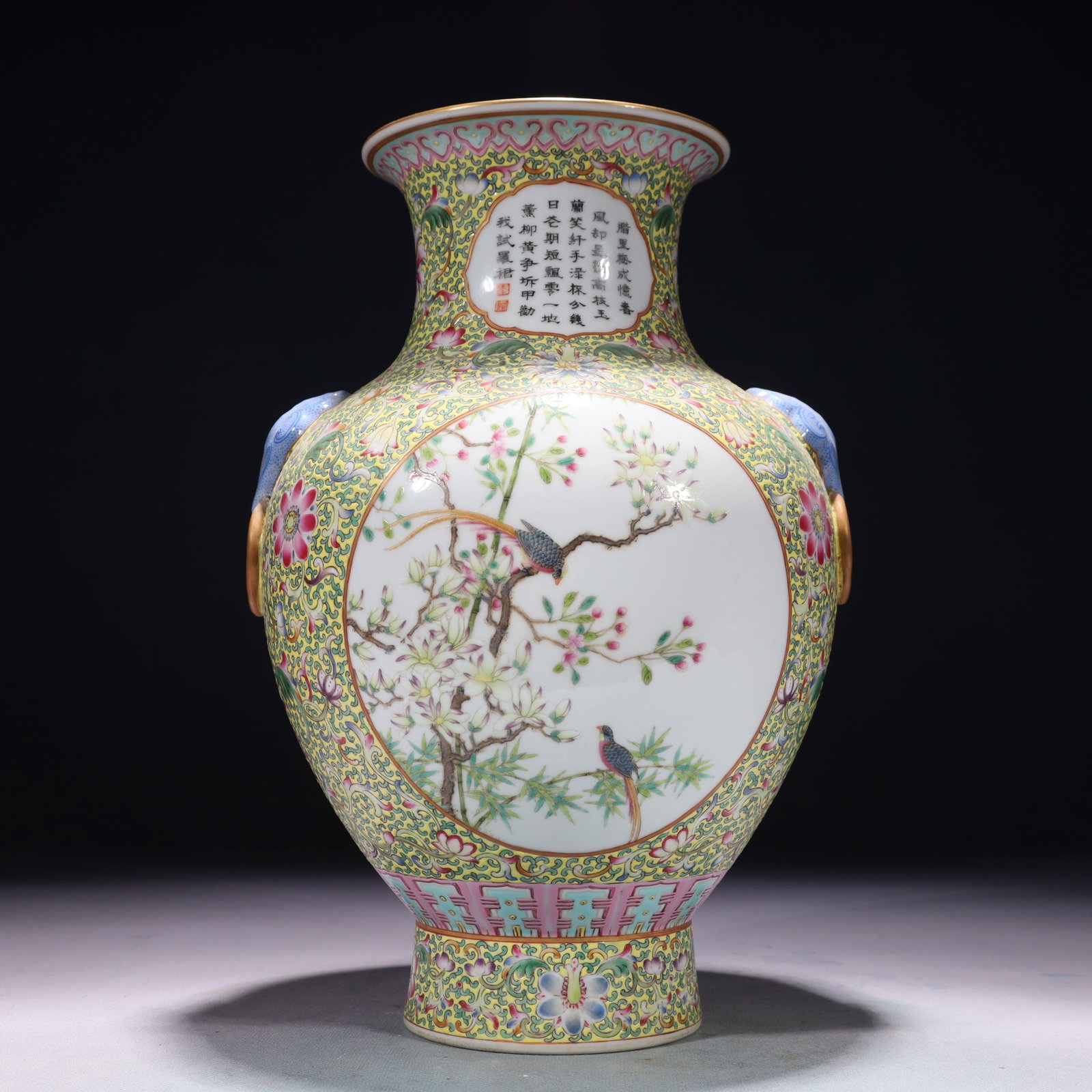 An Exquisite Yellow Ground Famille-Rose Painted Gold Flower and Bird Pattern Beast-Ears Vase,with: An Exquisite Yellow Ground Famille-Rose Painted Gold Flower and Bird Pattern Beast-Ears Vase,with poem,Qing Dynasty,China,Qianlong Six-character Mark,Size:7.9inx12.2in,Weight:2200g 黄地