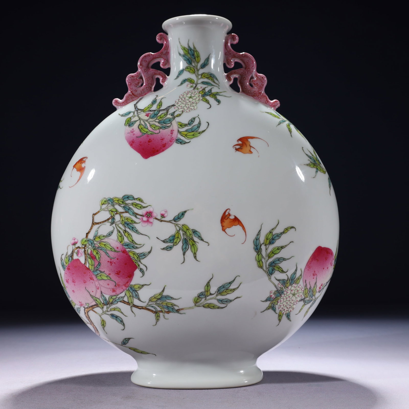 An Exquisite Famille-Rose Bats and Peach Pattern Double-Ears Vase: An Exquisite Famille-Rose Bats and Peach Pattern Double-Ears Vase,Qing Dynasty,China,Qianlong Six-character Mark,Size:9.8inx8.3inx13in,Weight:3100g 粉彩福寿纹双 