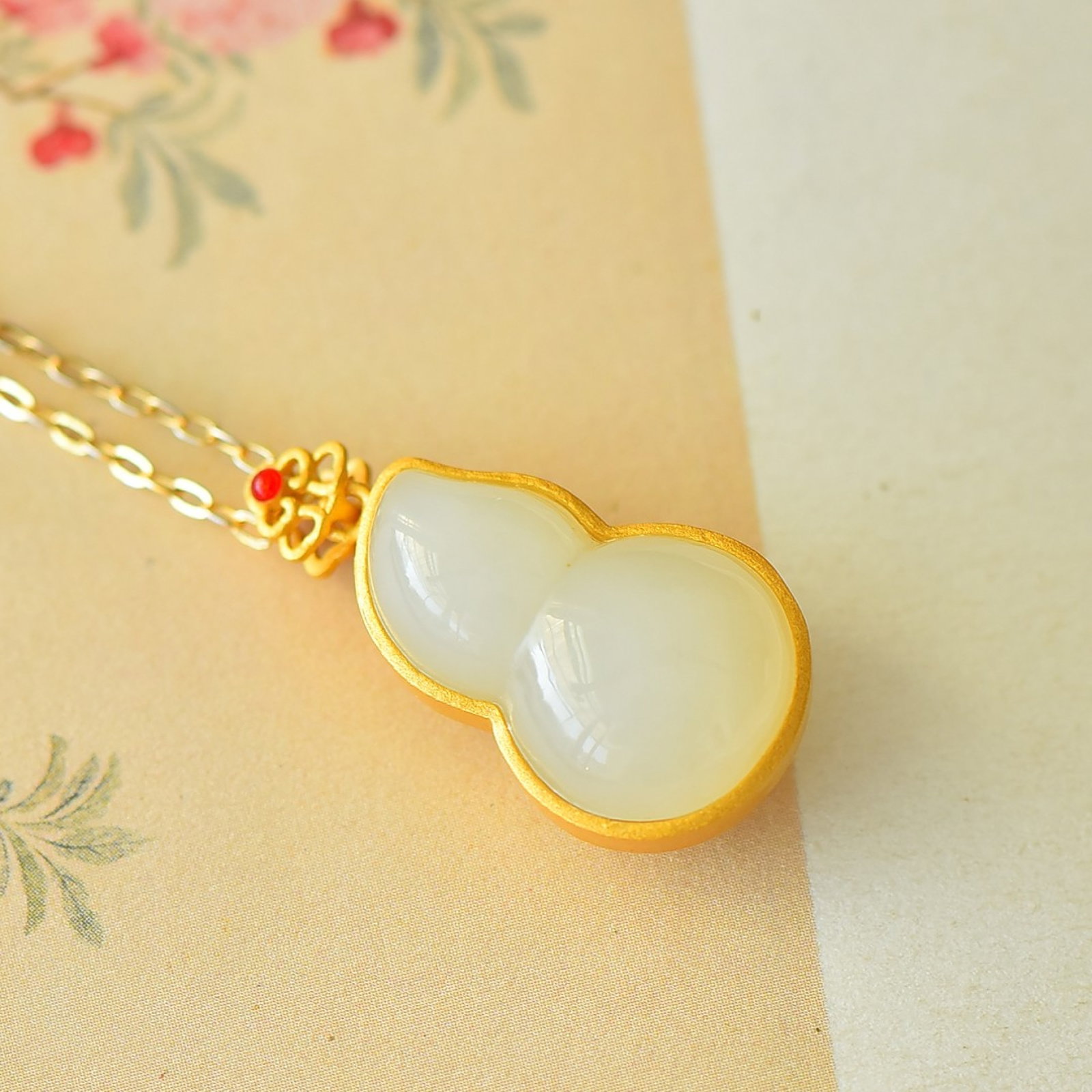 An Exquisite Sterling Silver-Gold Plated Inlaid White Jade Pendant: An Exquisite Sterling Silver-Gold Plated Inlaid White Jade Pendant 纯银镀金镶白玉吊坠