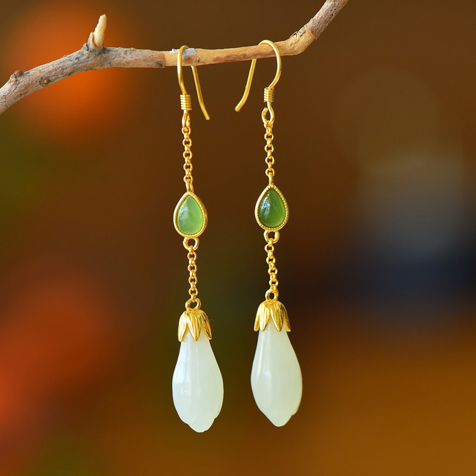 A Pair of Exquisite Sterling Silver-Gold Plated Inlaid White Jade Earrings: A Pair of Exquisite Sterling Silver-Gold Plated Inlaid White Jade Earrings,Size:0.3inx0.7in 一对纯银镀金镶白玉耳环