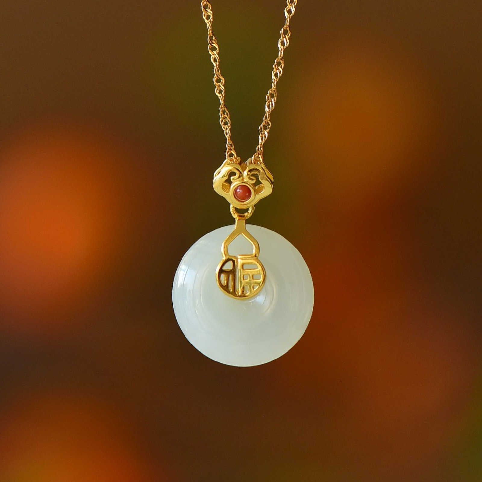 An Exquisite Sterling Silver-Gold Plated Inlaid White Jade Pendant: An Exquisite Sterling Silver-Gold Plated Inlaid White Jade Pendant,Size:0.7inx0.7in 纯银镀金镶白玉吊坠