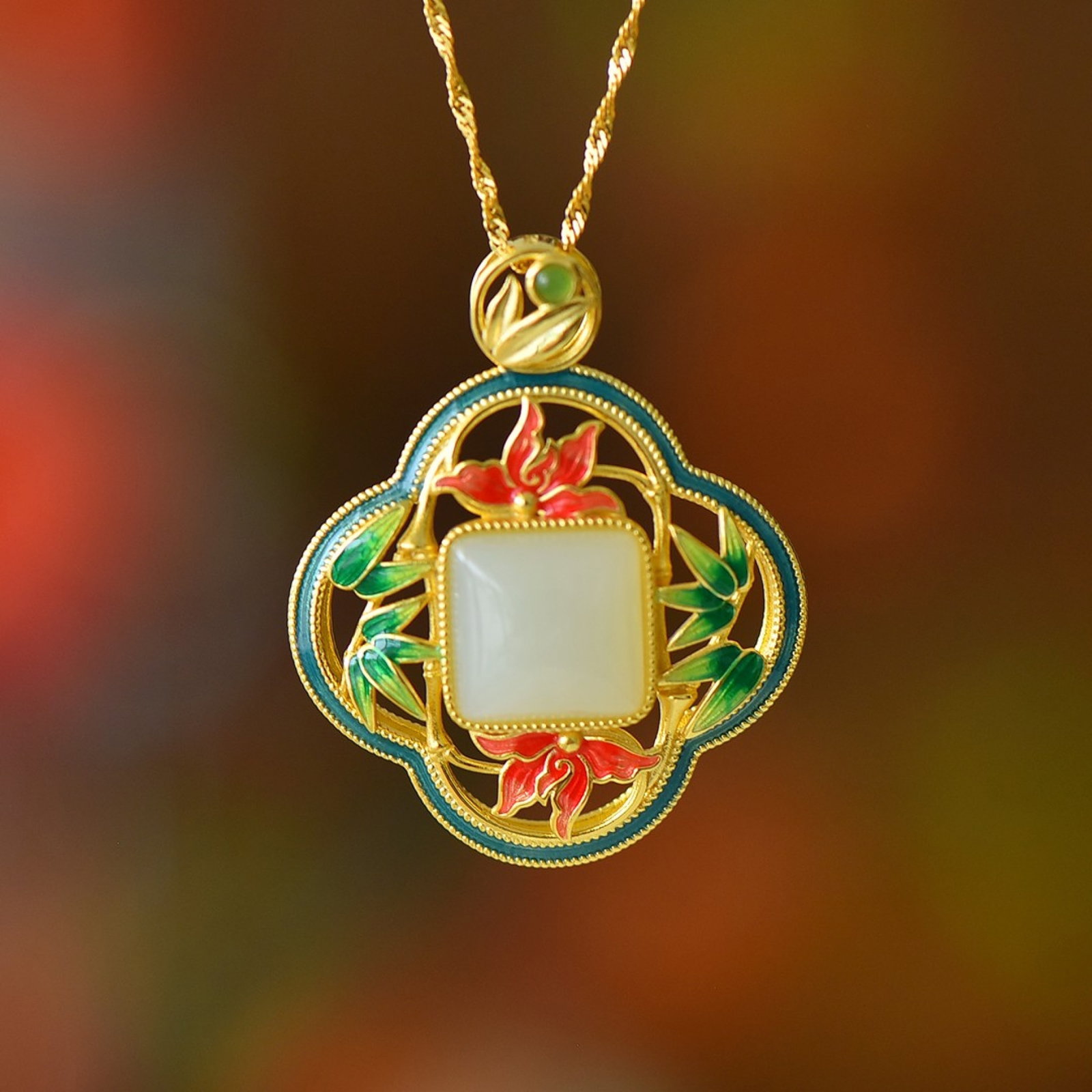 An Exquisite Sterling Silver-Gold Plated Inlaid White Jade Pendant: An Exquisite Sterling Silver-Gold Plated Inlaid White Jade Pendant 纯银镀金镶白玉吊坠