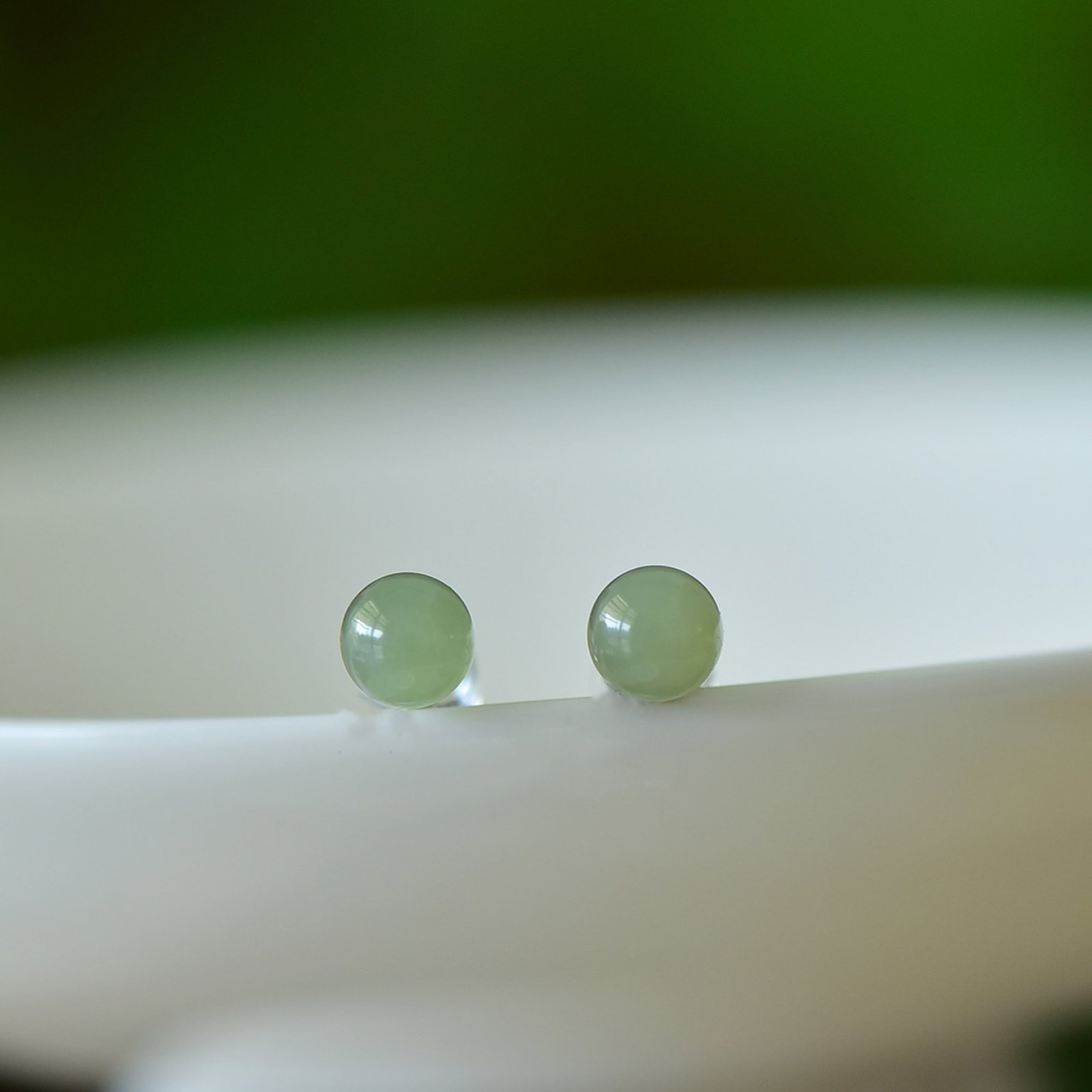 A Pair of Exquisite Sterling Silver Inlaid Greenish Jade Earrings: A Pair of Exquisite Sterling Silver Inlaid Greenish Jade Earrings,Size:0.3inx0.3in 一对纯银镶青玉耳环