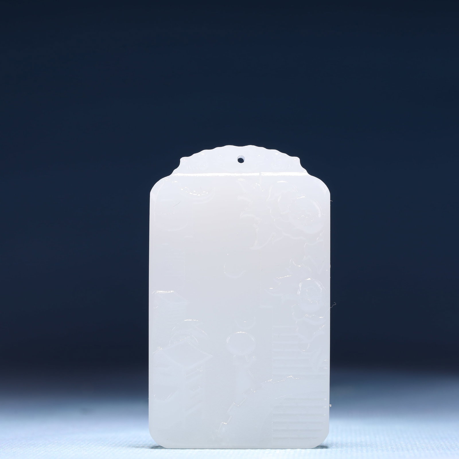 An Exquisite White Jade Flower Pattern Pendant: An Exquisite White Jade Flower Pattern Pendant,Size:1.6inx0.4inx2.4in,Weight:48g 白玉花卉纹牌