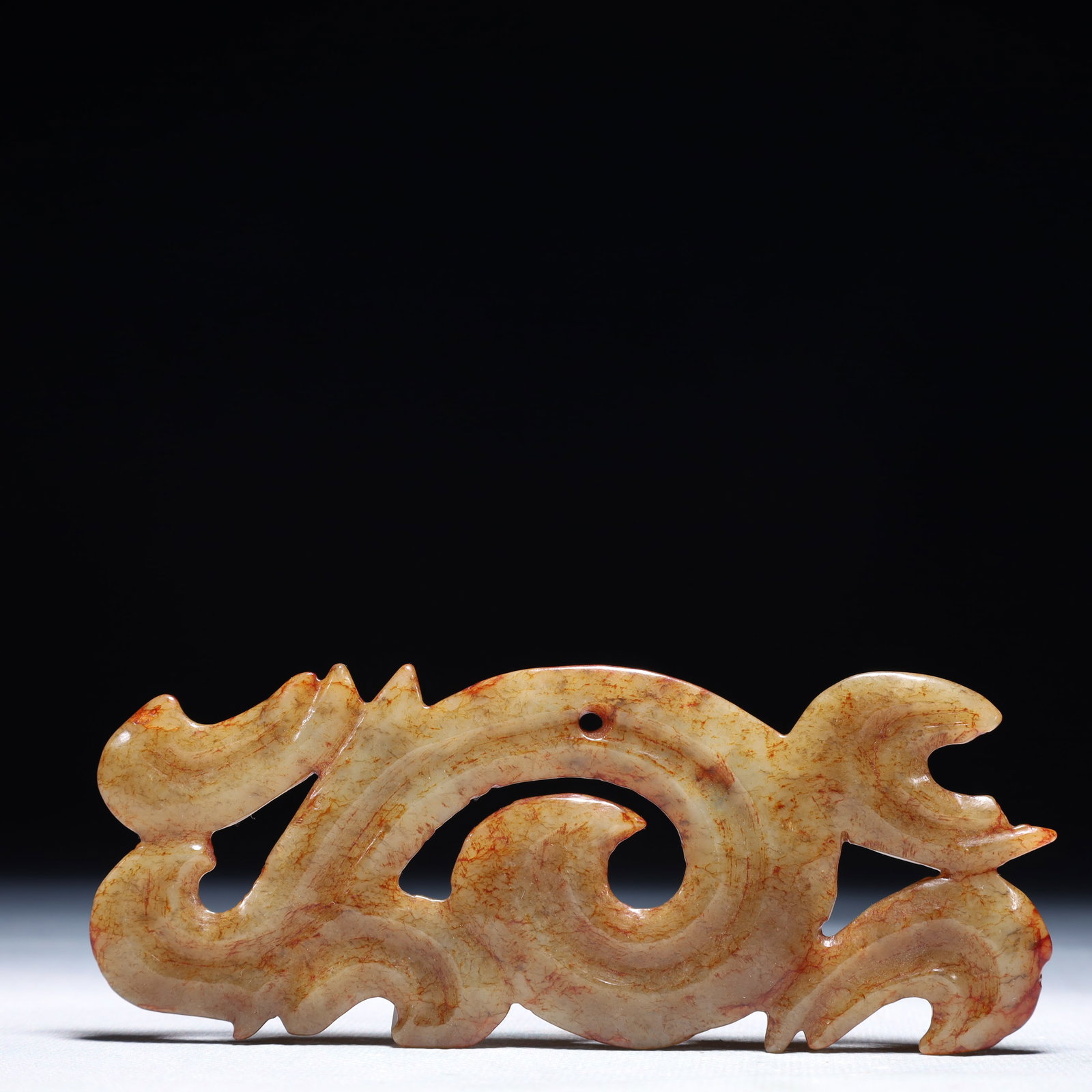 An Archaic Hongshan Culture White Jade Dragon Pendant: An Archaic Hongshan Culture White Jade Dragon Pendant,Ancient Time,China,Size:5.3inx2.2in,Weight:62.1g ?????????,???????