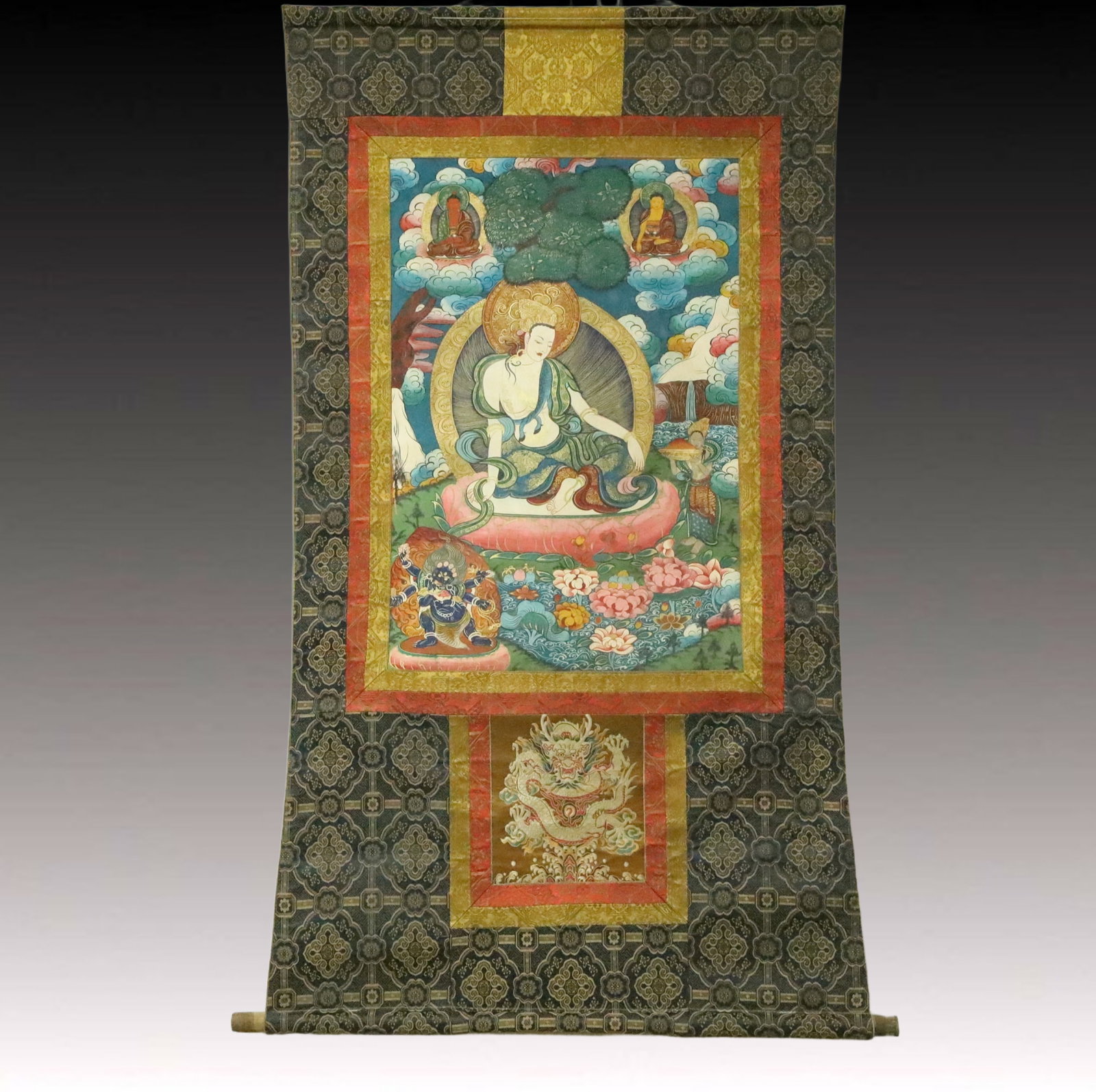 A Rare Brocade Painted Color Statue of Avalokitesvara Tangka: A Rare Brocade Painted Color Statue of Avalokitesvara Tangka,Qing Dynasty, China,Size:33.5inx58.3in 织锦彩绘自在观音像唐卡,中