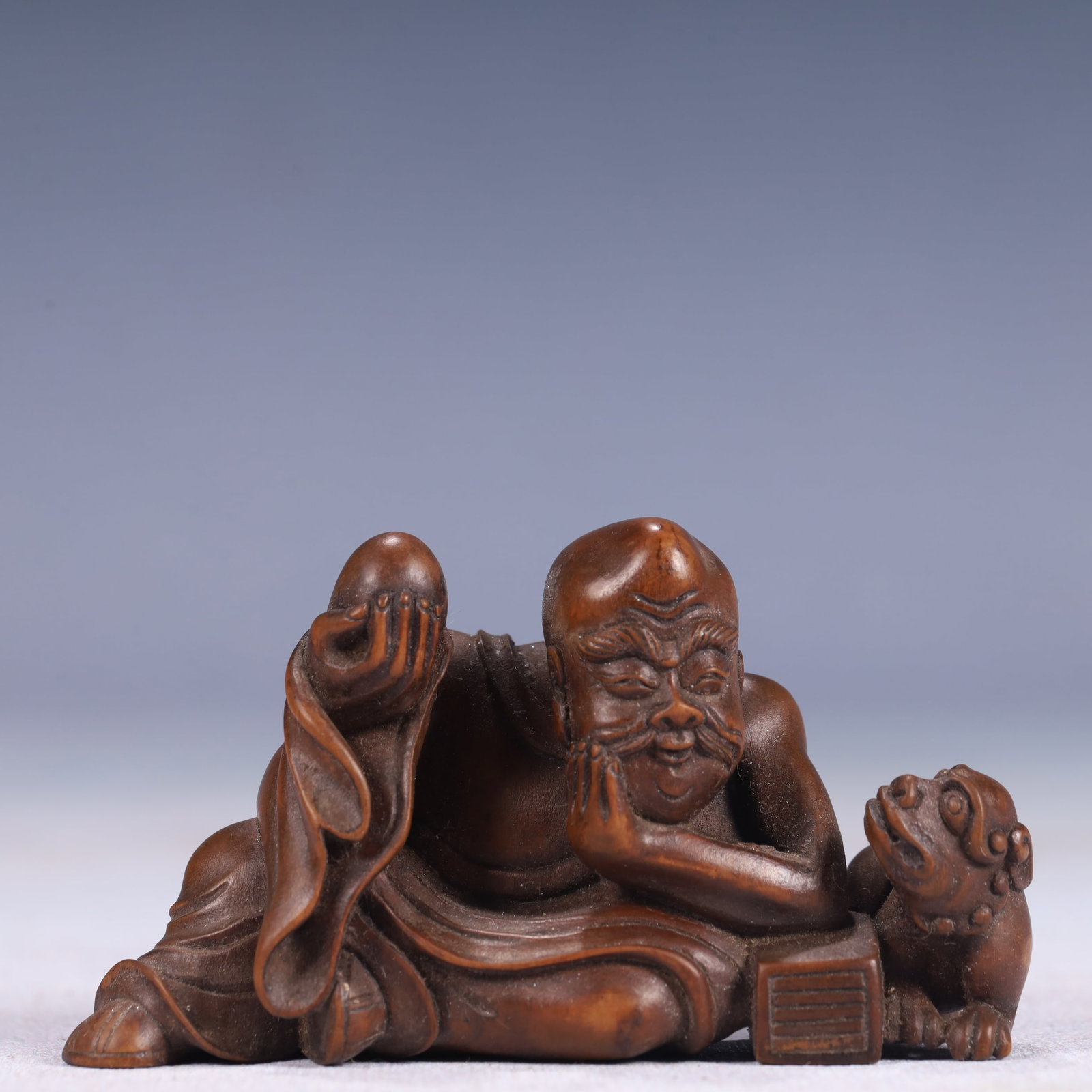 An Exquisite Boxwood Figure Ornament: An Exquisite Boxwood Figure Ornament,Qing Dynasty, China,Size:3.1inx1.4inx1.8in,Weight:50g 黄杨木人物摆件,中国清代