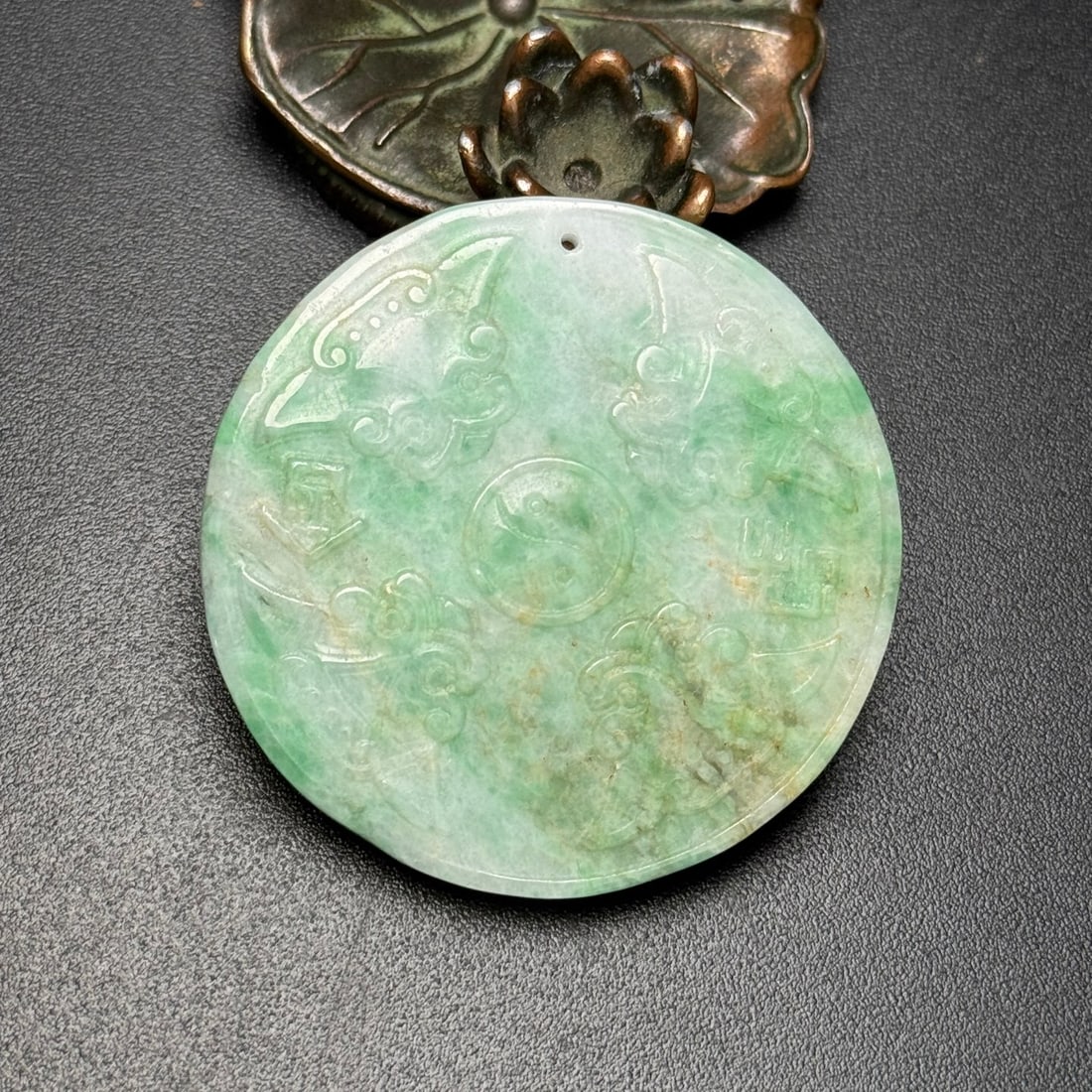 An Exquisite Jadeite Trigram Pattern Pendant: An Exquisite Jadeite Trigram Pattern Pendant,Qing Dynasty,China,Size:50mmx5mm,Weight:29g 翡翠八卦纹挂件,中国清代