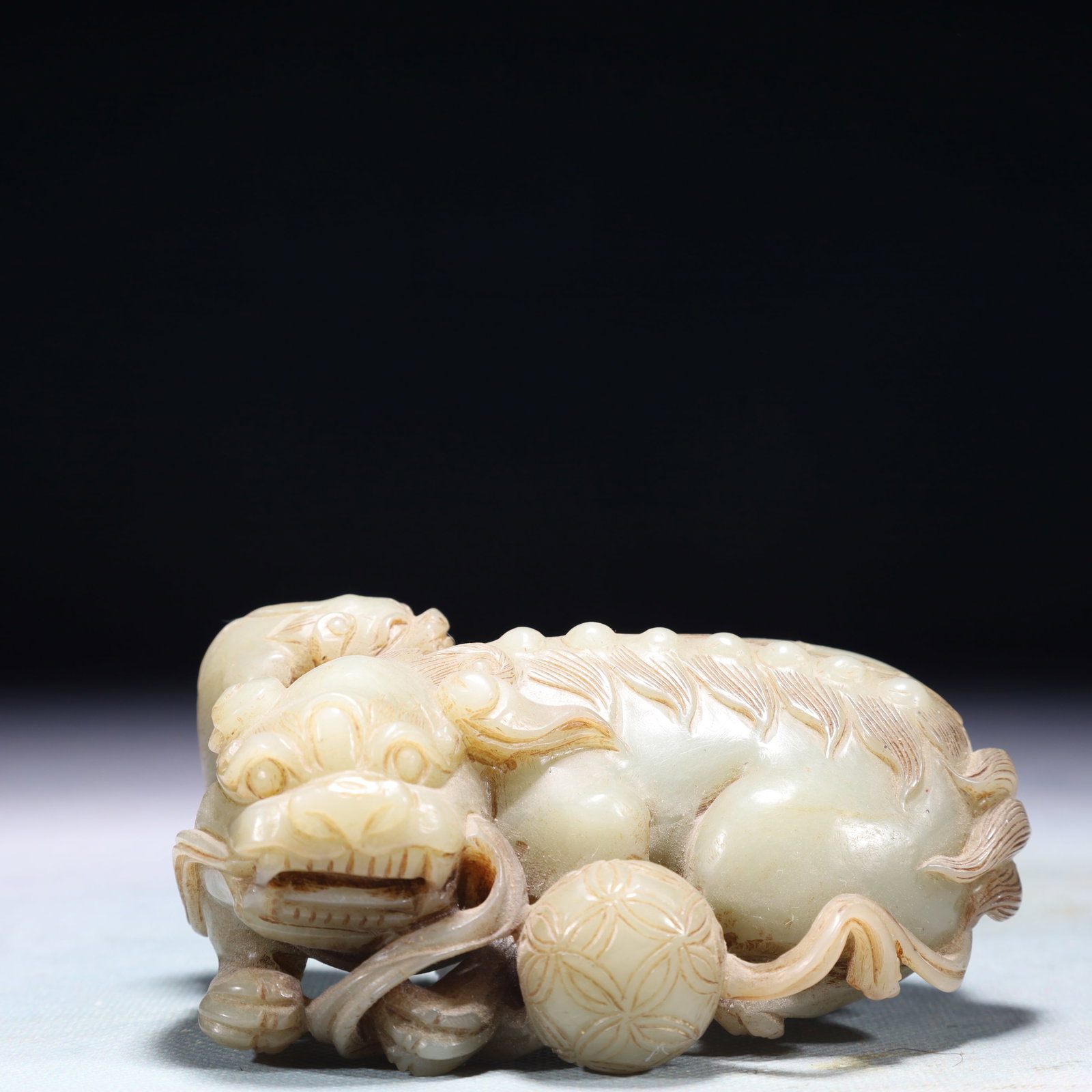 An Exquisite White Jade Lion Ornament