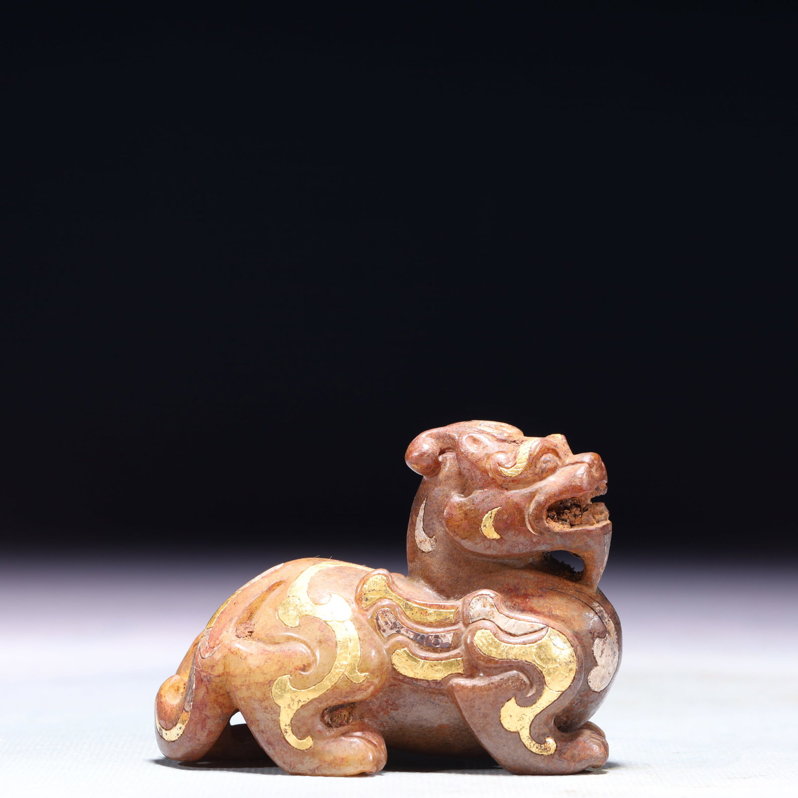 An Exquisite Archaic Jade Inlaid Gold and Silver Beast Ornament: An Exquisite Archaic Jade Inlaid Gold and Silver Beast Ornament,Ancient Time,China,Size:3inx1.2inx2.2in,Weight:176.2g