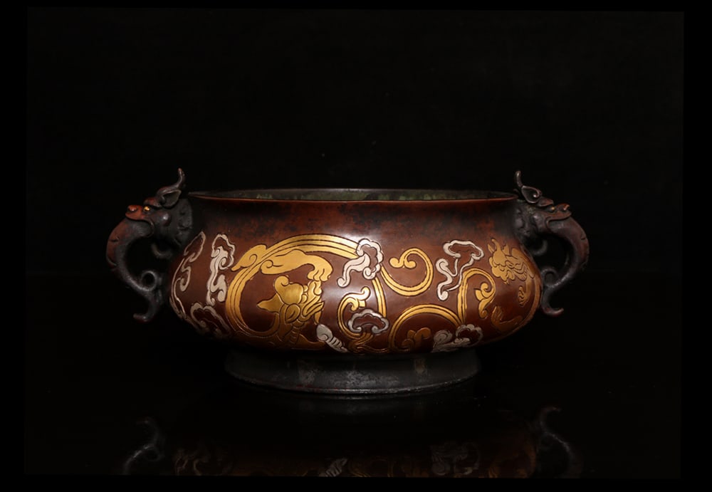 An Exquisite Silver-Gilt Bronze Auspicious Animal Pattern Dragon-Ears Censer: An Exquisite Silver-Gilt Bronze Auspicious Animal Pattern Dragon-Ears Censer,Ming Dynasty,China,With Mark,Size:3.7inx6.7inx10in,Weight:3400g,铜鎏金鎏银瑞兽