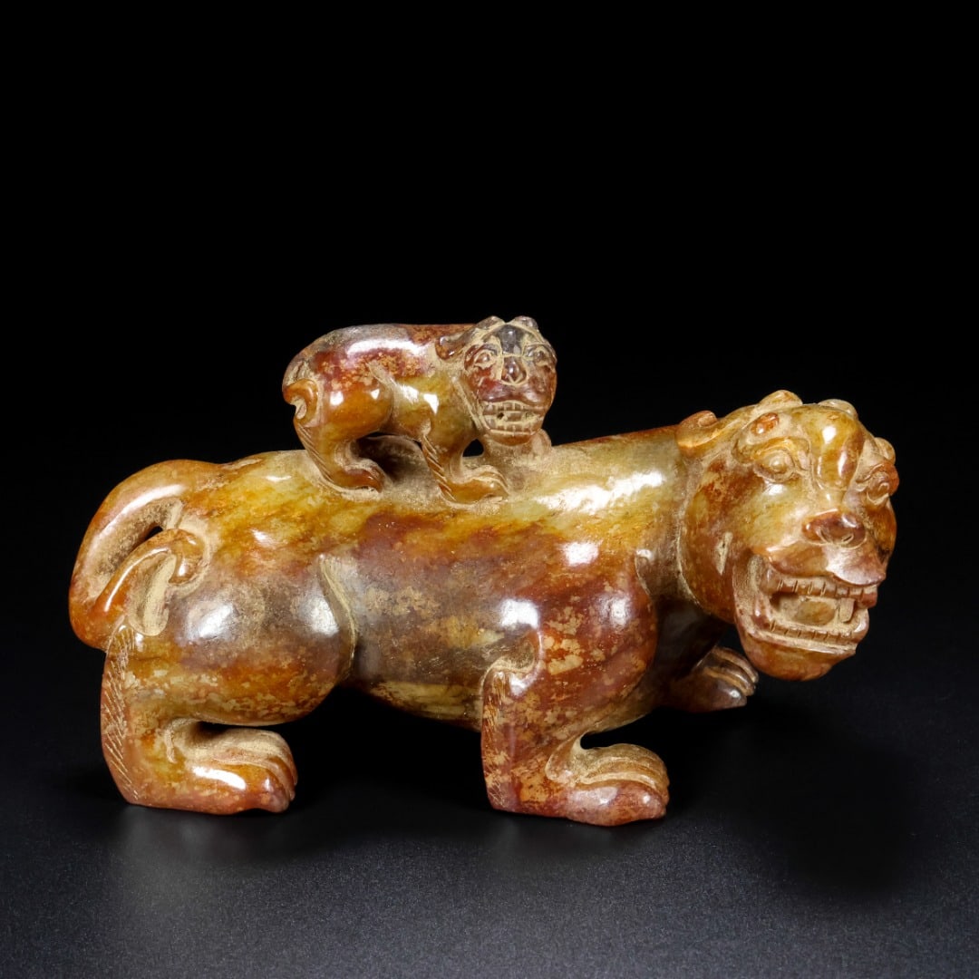 An Exquisite White Jade Auspicious Animal Ornament