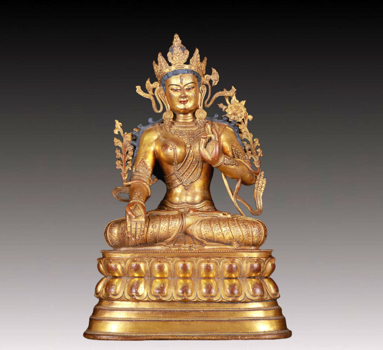 A Rare Gilt Bronze Statue of Green Tara: A Rare Gilt Bronze Statue of Green Tara,Qing Dynasty,China,Mark of Qianlong,Size:6.3inx4.5inx9.8in,Weight:1860g