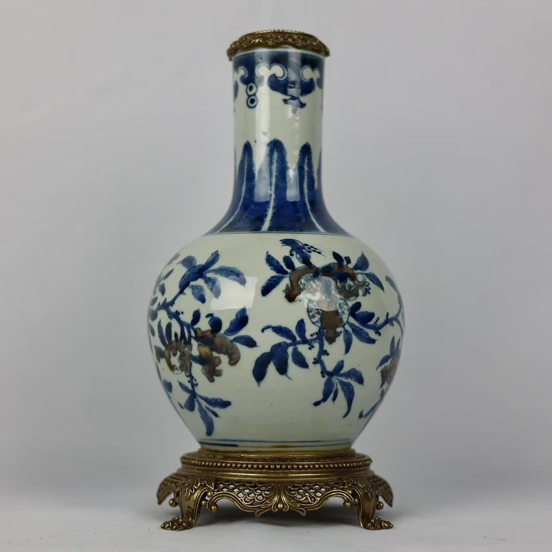 An Exquisite Blue and White Underglaze-Red Inlaid Bronze Flower and Fruit Pattern Vase: An Exquisite Blue and White Underglaze-Red Inlaid Bronze Flower and Fruit Pattern VaseQing Dynasty,China,Qianlong Six-character