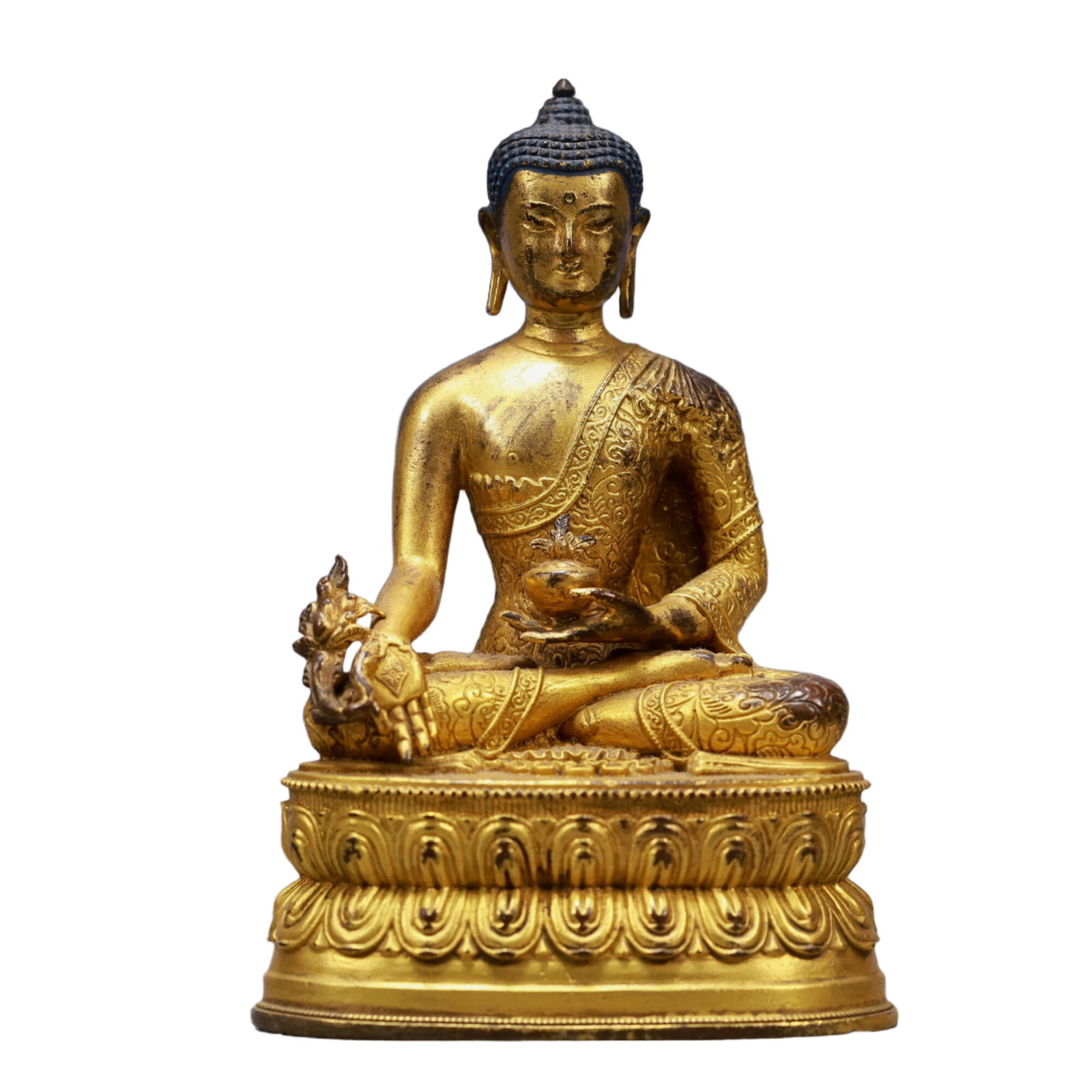 A Solemn Gilt Bronze Statue of Sakyamuni: A Solemn Gilt Bronze Statue of Sakyamuni,Qing Dynasty, China,Size:3.1inx2inx4.9inWeight:300g 铜鎏金释迦牟尼像,中国清代