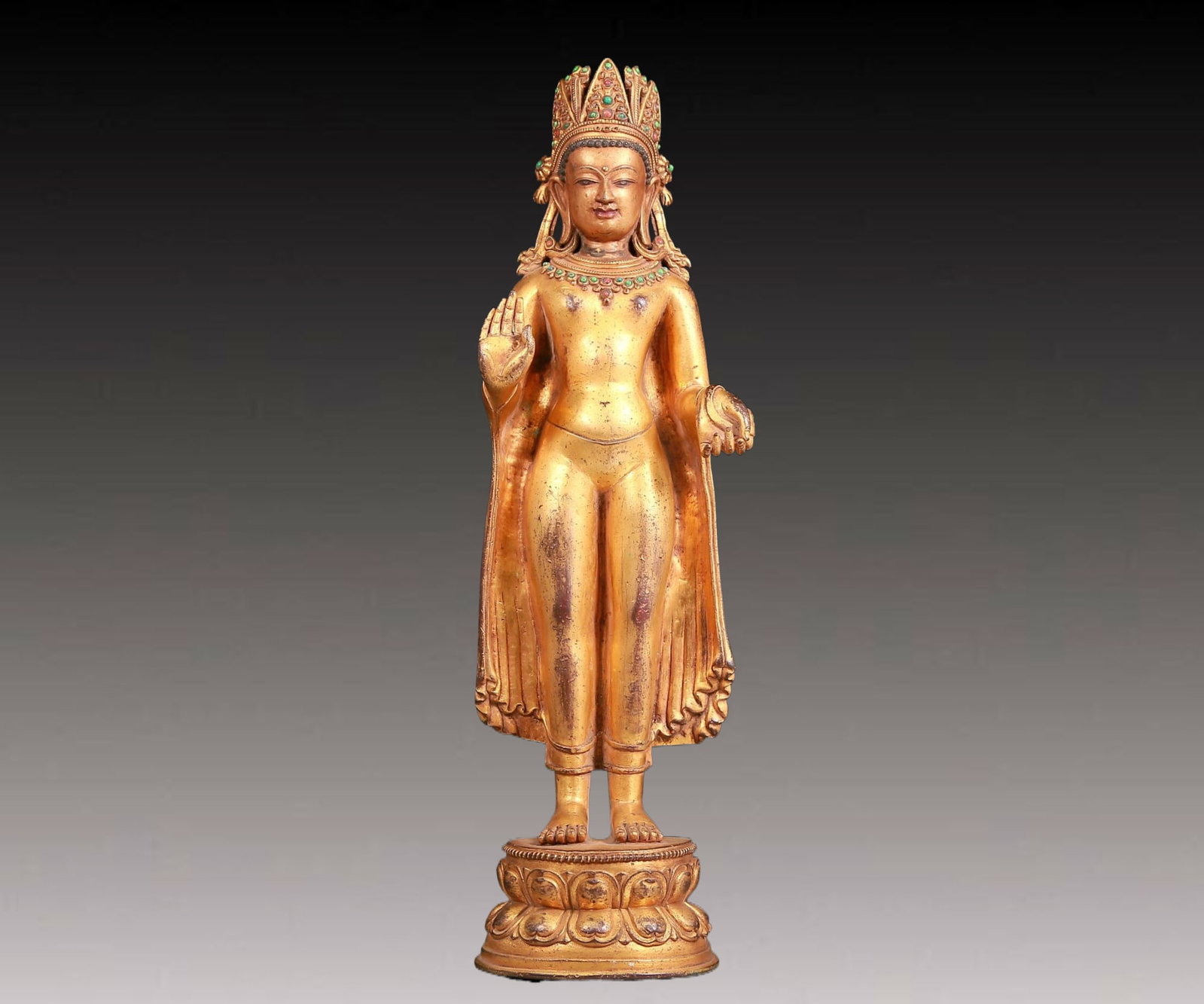 A solemn gilt bronze statue of Tathagata inlaid gems: A solemn gilt bronze statue of Tathagata inlaid gems,with inscription,Ming Dynasty,China,Size:4.5inx3.9inx17.3in,Weight:4940g
